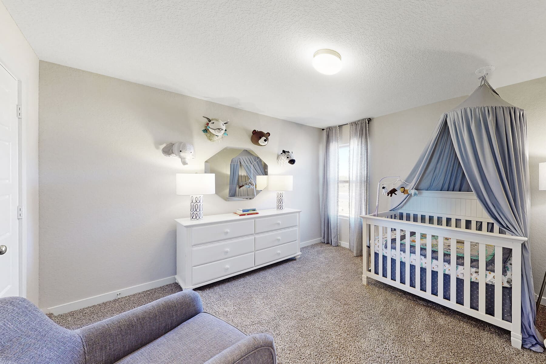 Nursery Room With Minimal Blue Hues