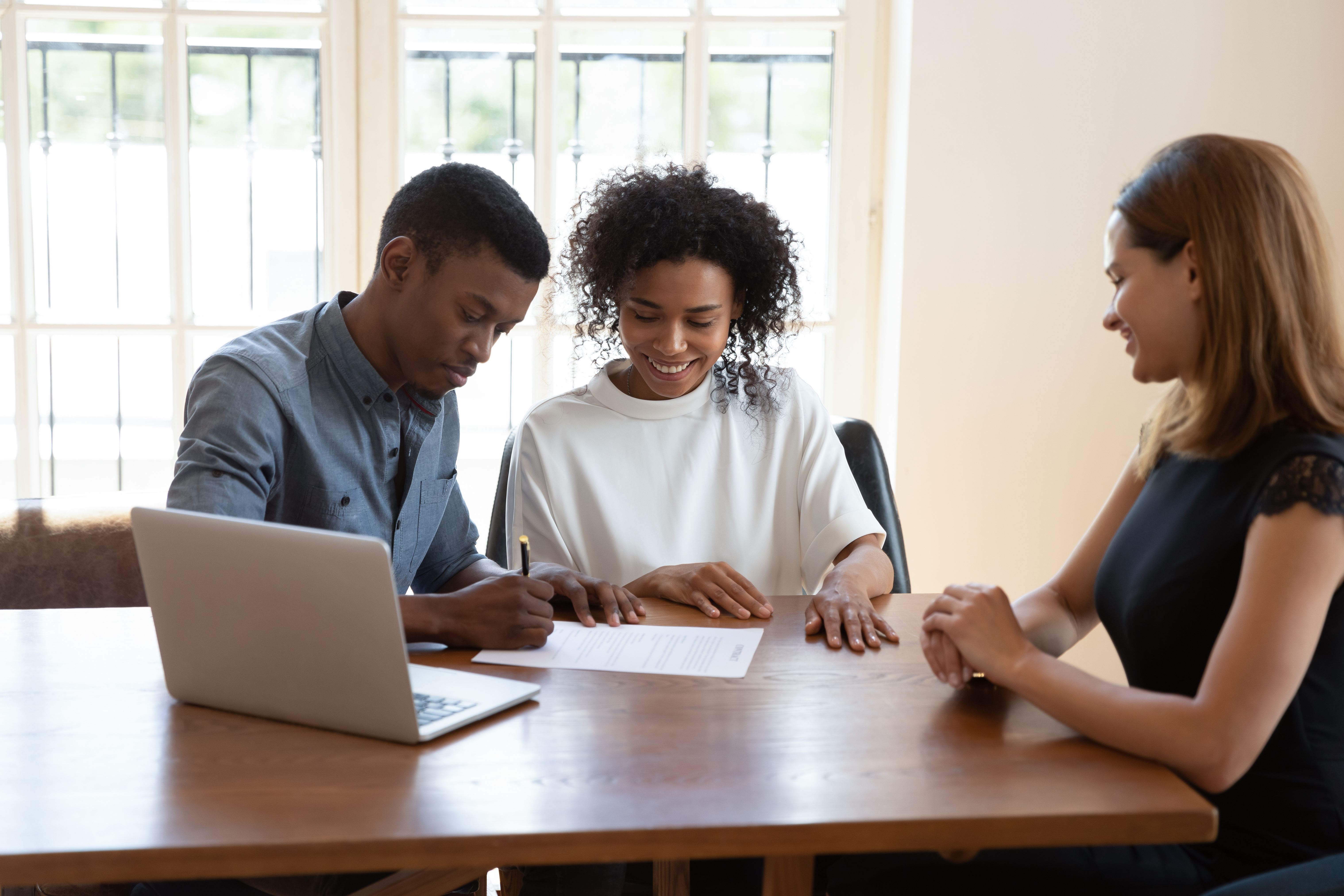 Couple meeting with finance lady