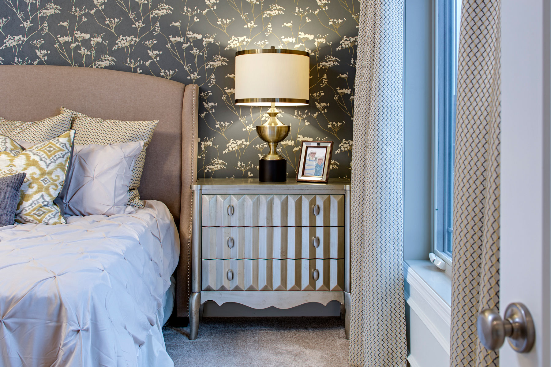Bedroom With Floral, Modern Wallpaper and Metallic Accents