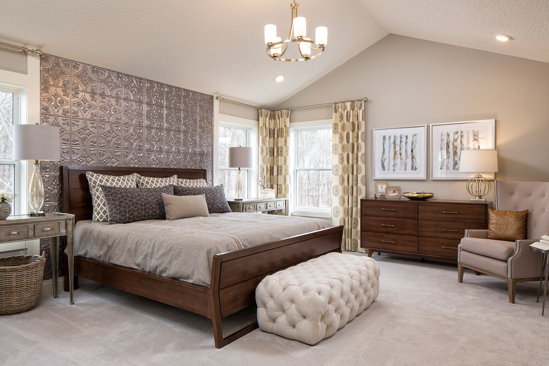 Owner's Bedroom With Wall Art Above Dresser