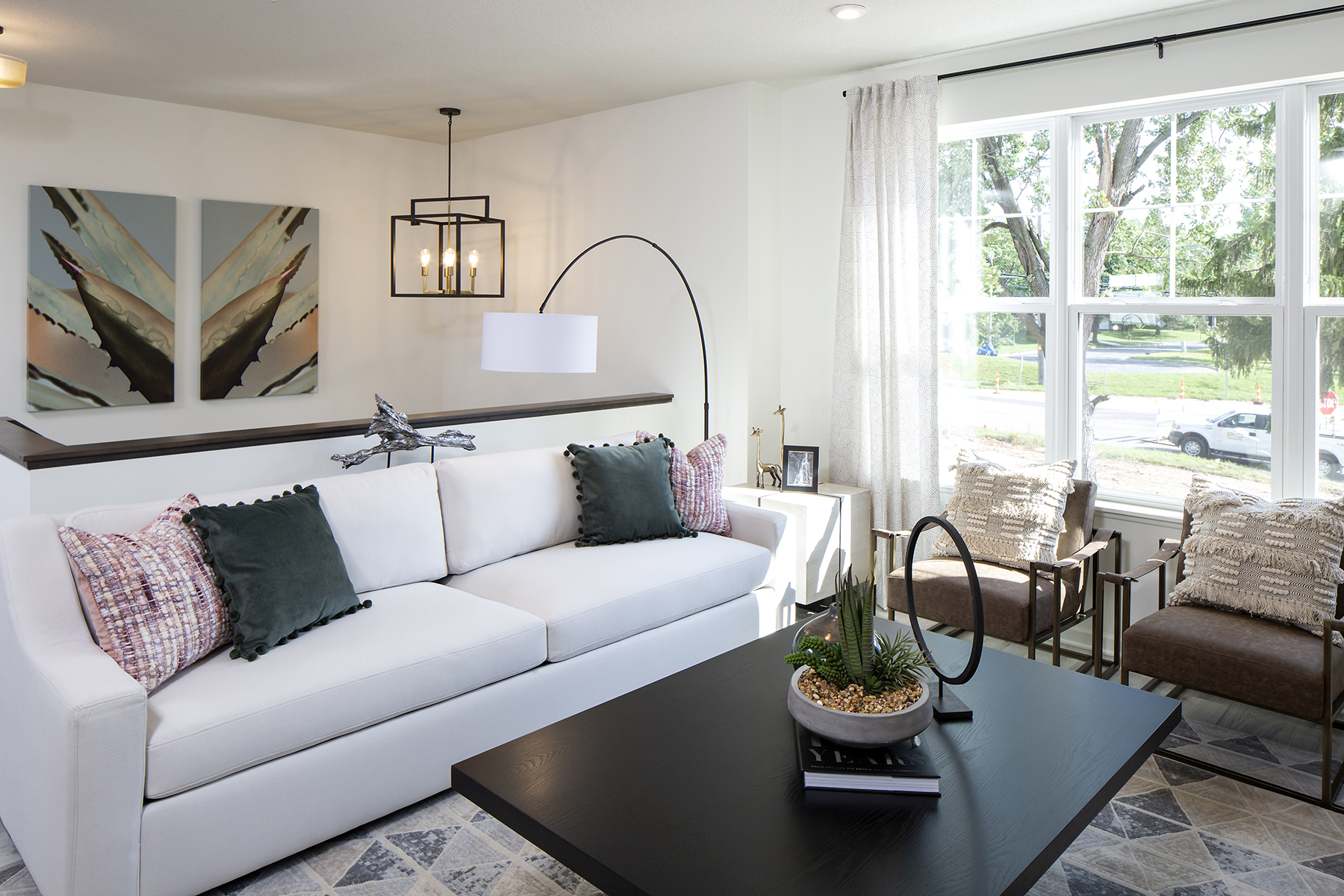 Living Room With Accent Chairs and Throw Pillows