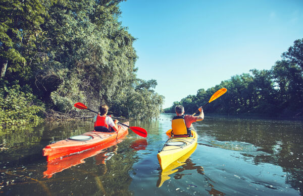 Couple kayaking in a river