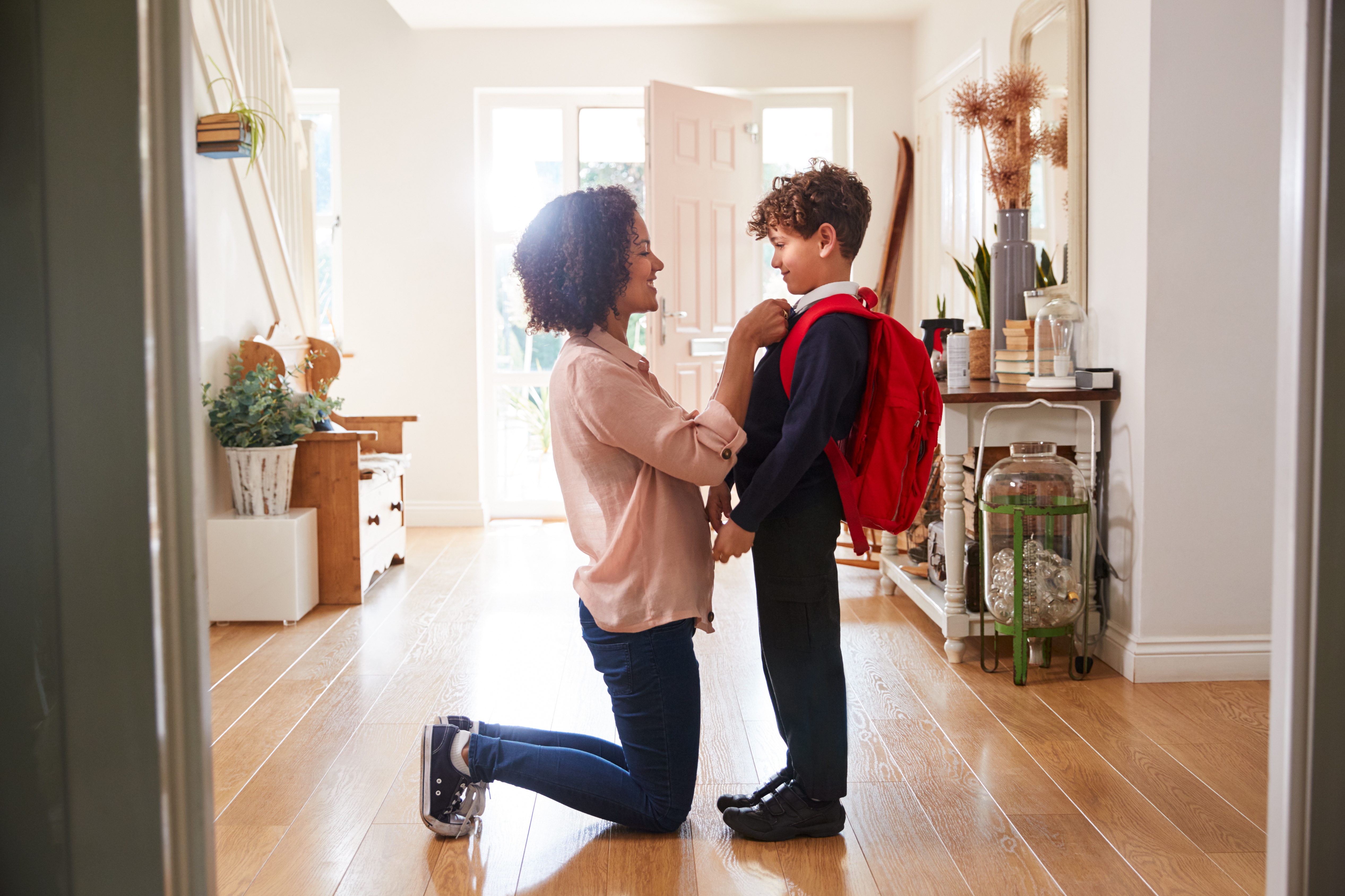 Mom Getting Son Ready for School