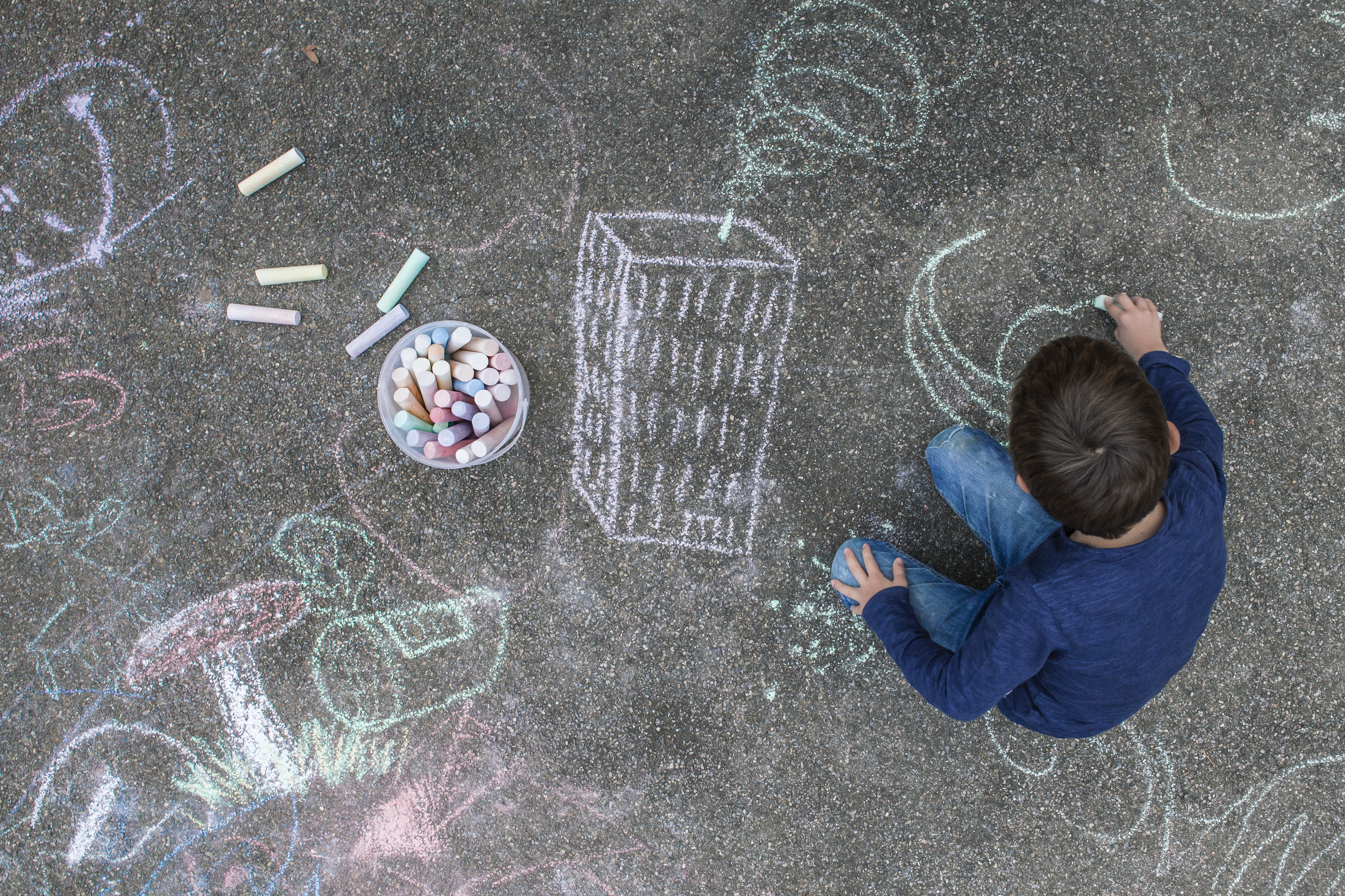 Person Making Chalk Art