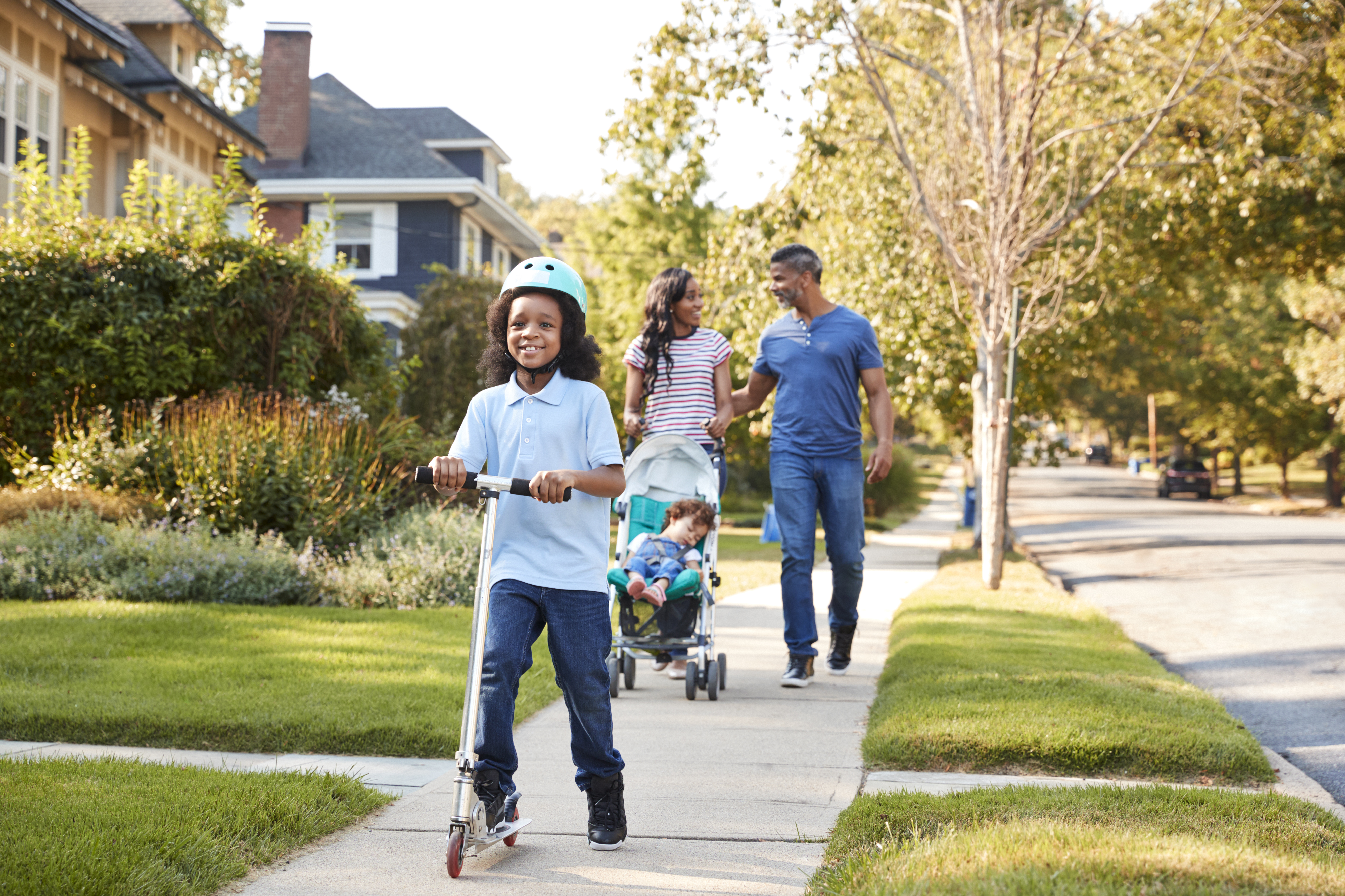 Family Walking in Neighborhood