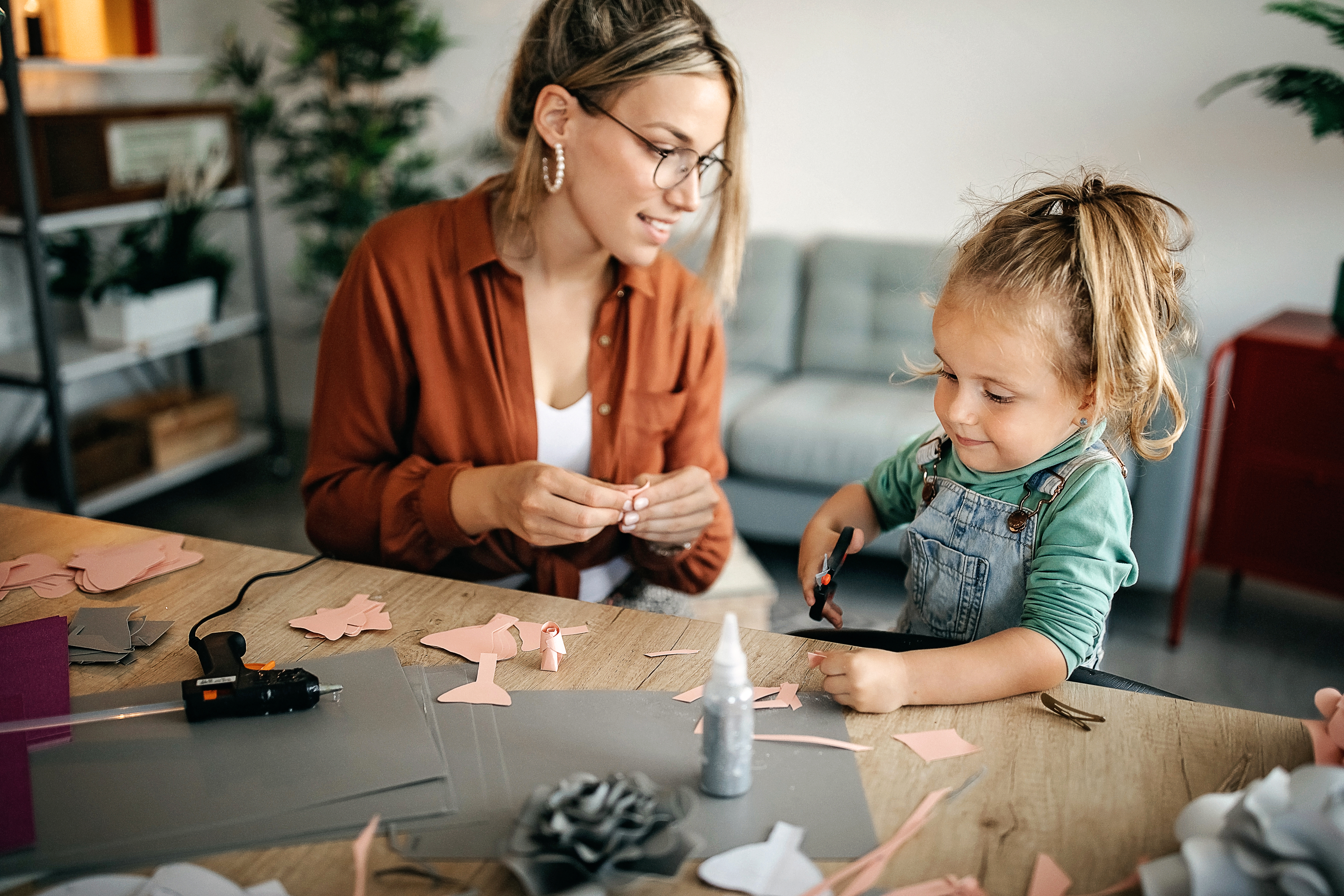 Mom and daughter making a paper craft