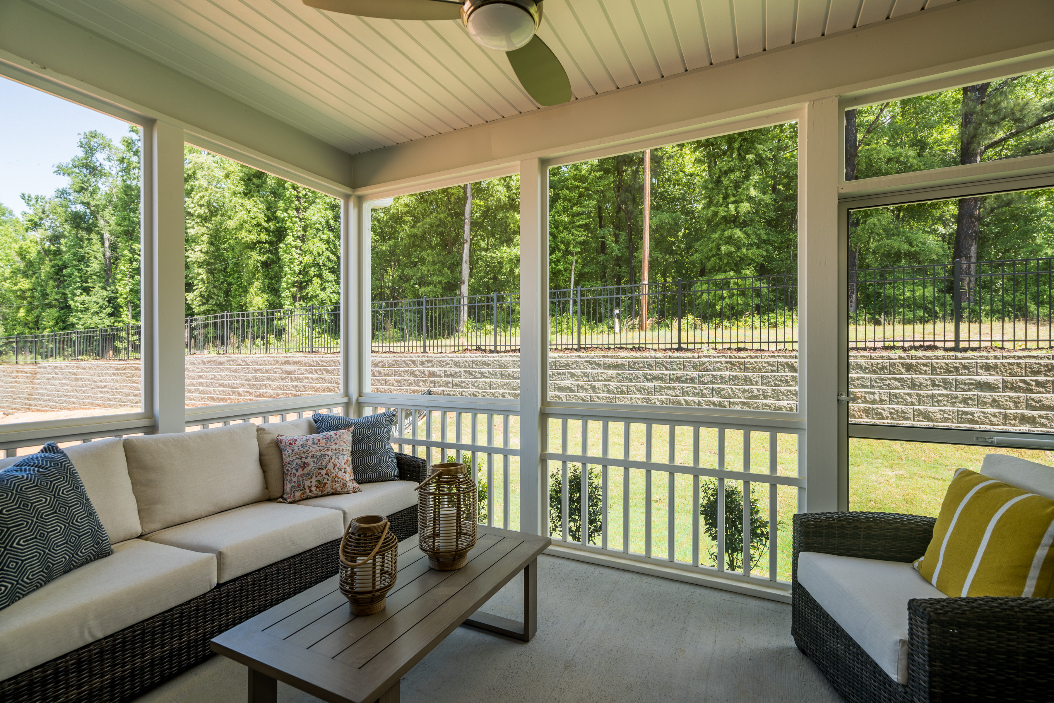 Screened-In Porch With Modern Patio Furniture