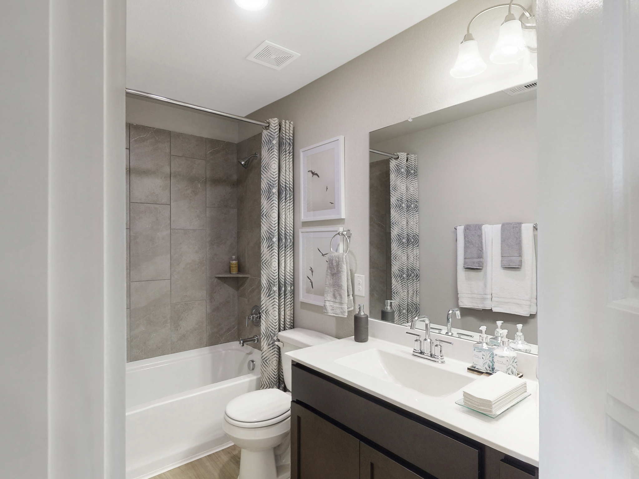 [Full Bathroom With Grey Shower Tile]