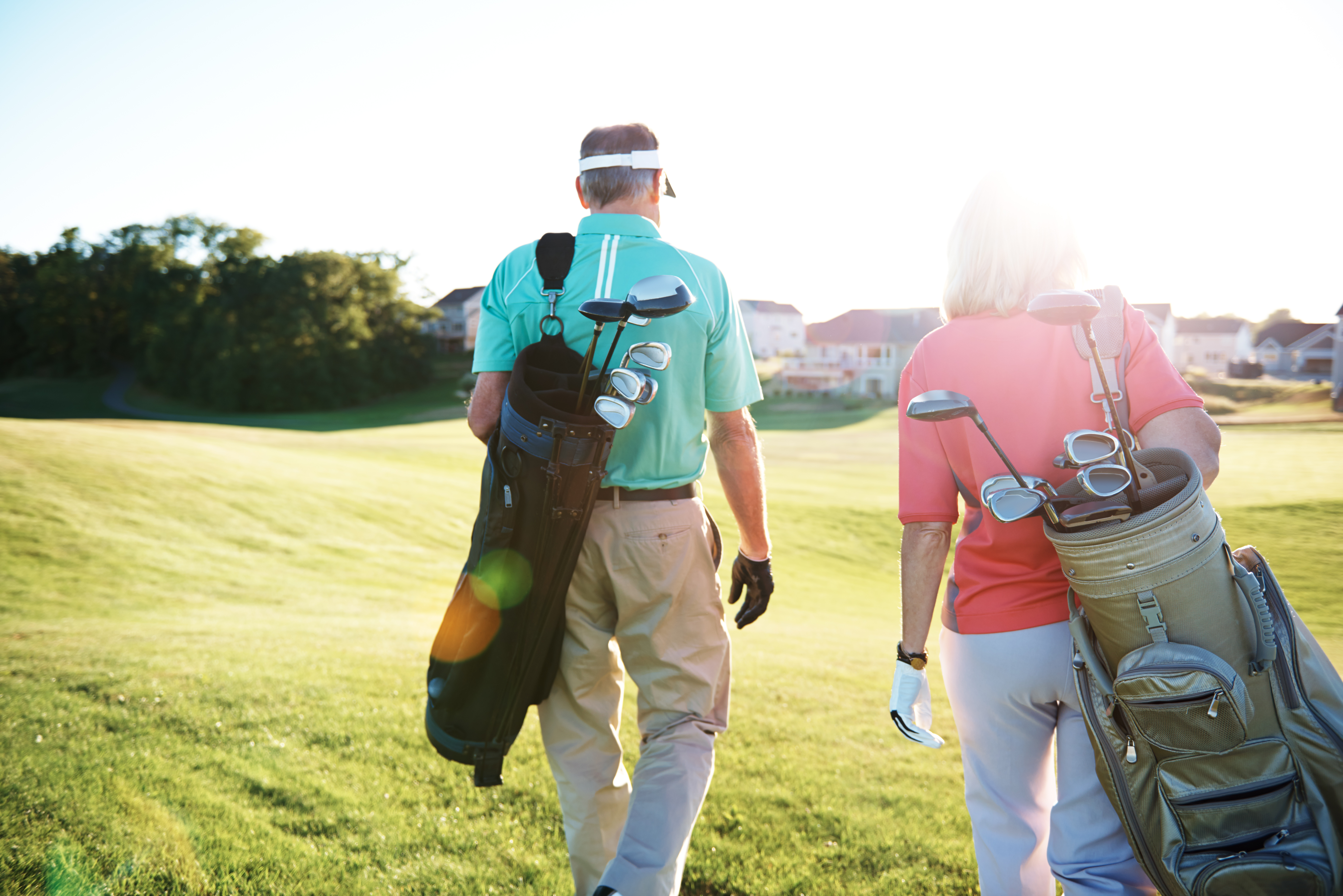 Couple Walking on Golf Course