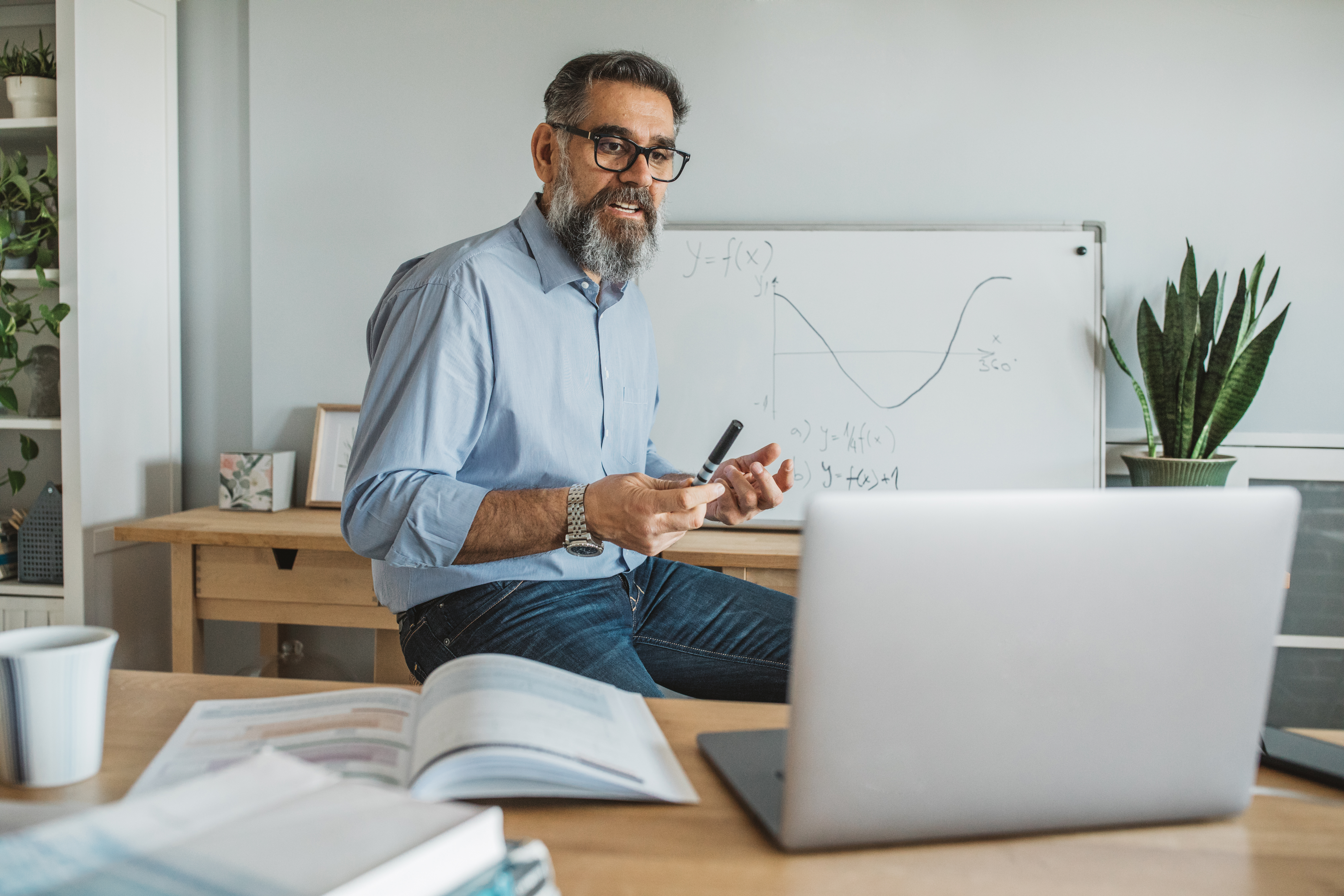 Man Giving Presentation During Virtual Meeting