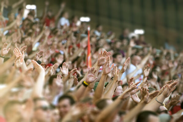 Closeup of a crowd of fans at a sporting event