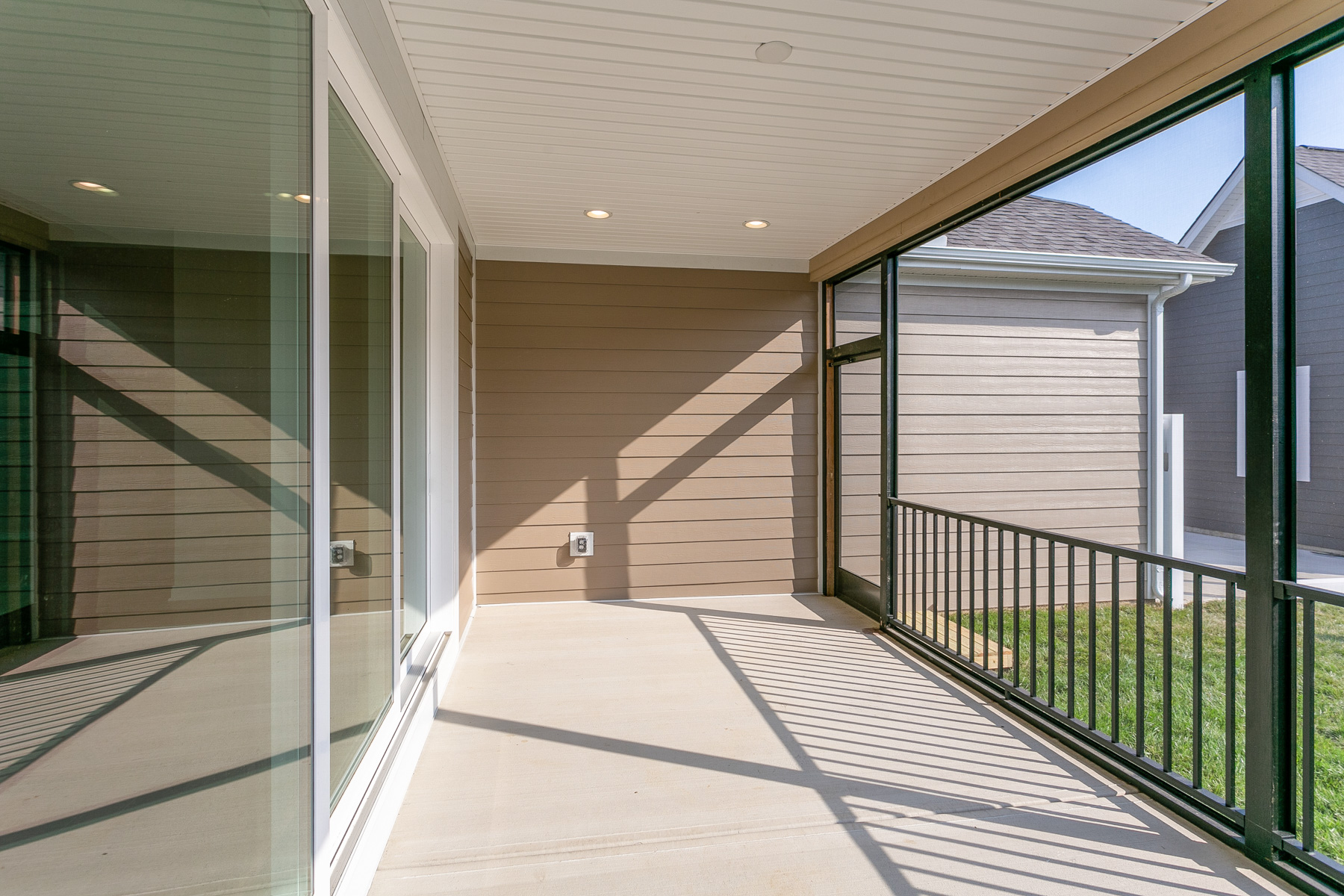 Empty Screened Porch in Backyard