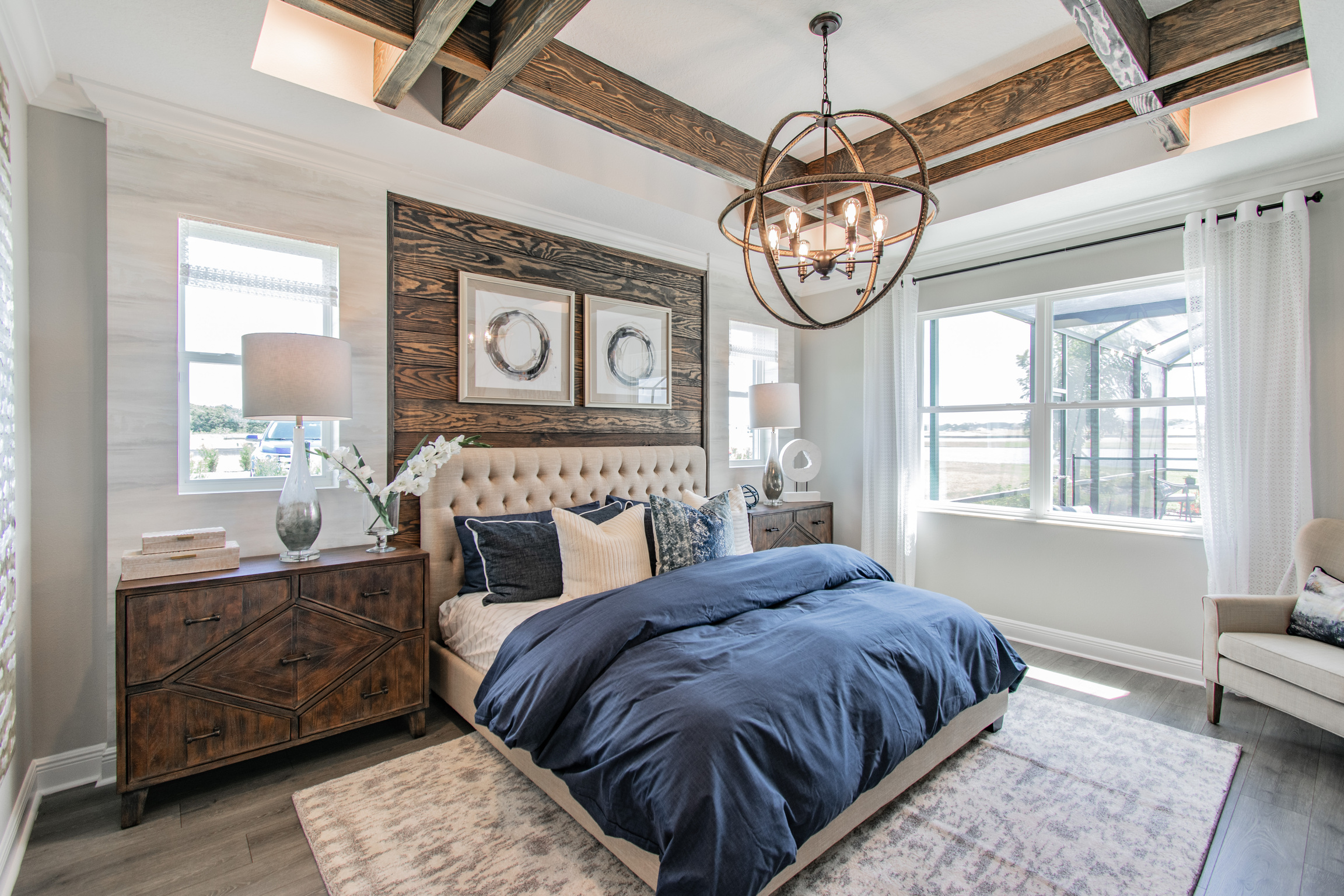 Bedroom With Industrial Chandelier