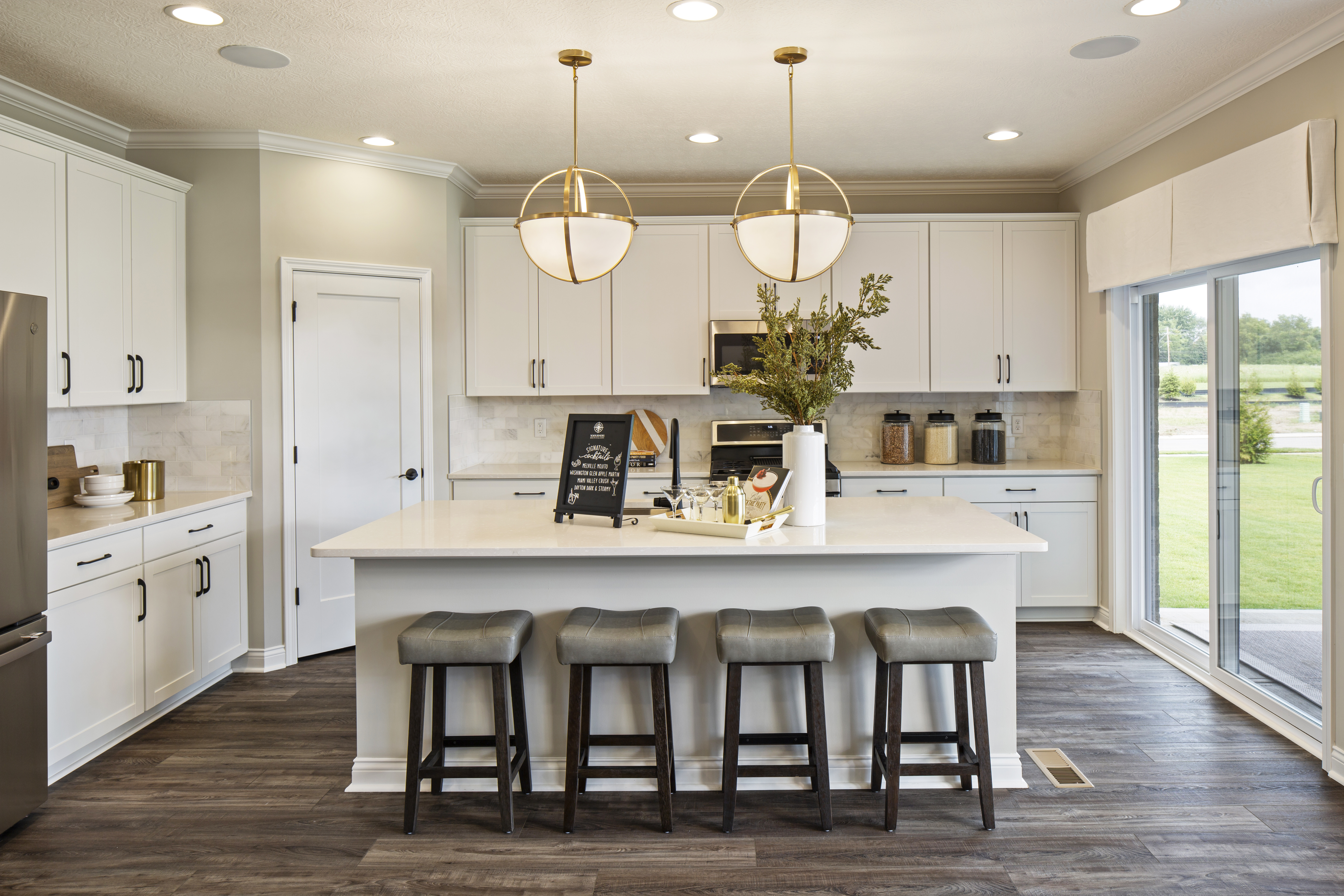 White Kitchen With Natural and Gold Accents