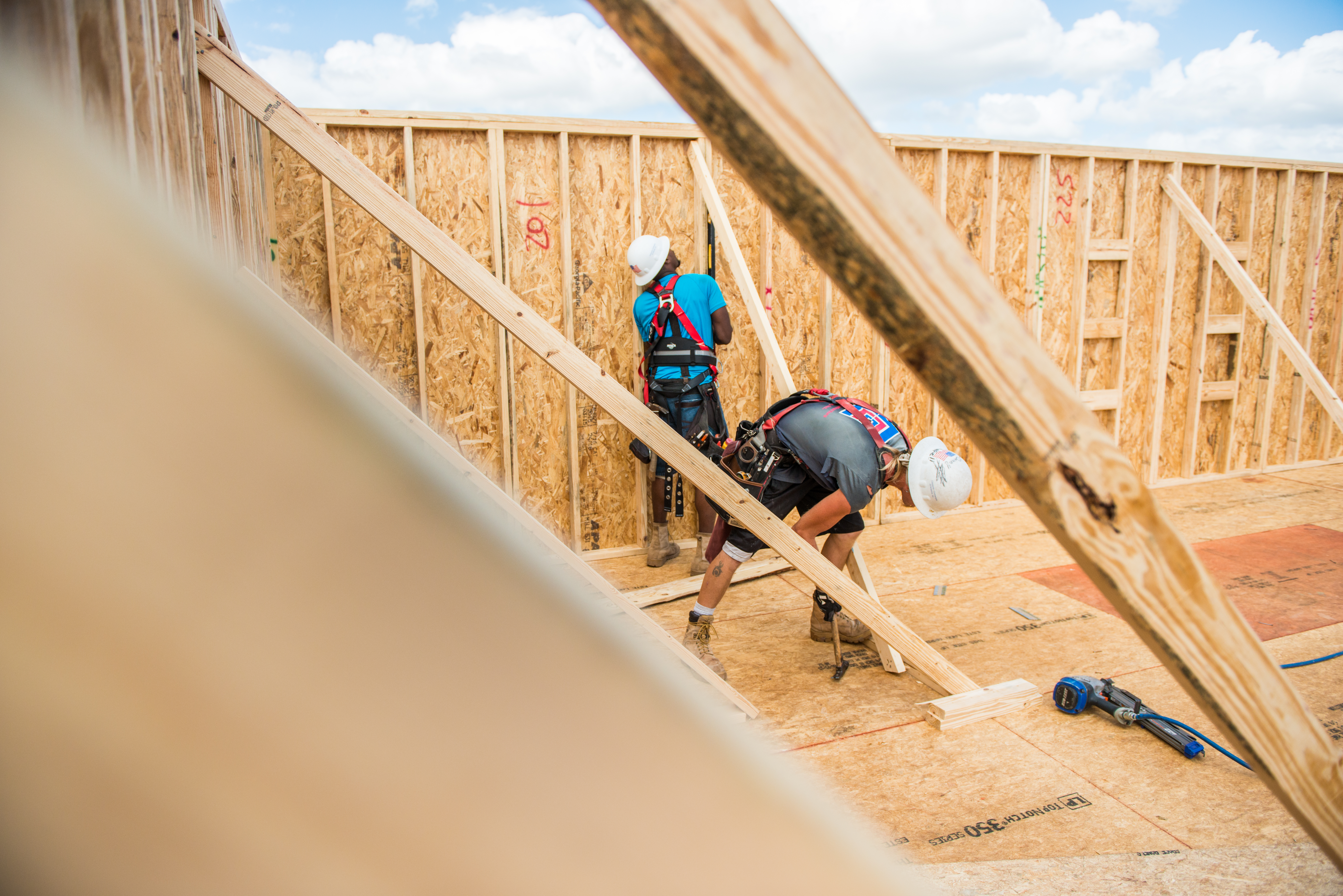 Construction Workers Building Home