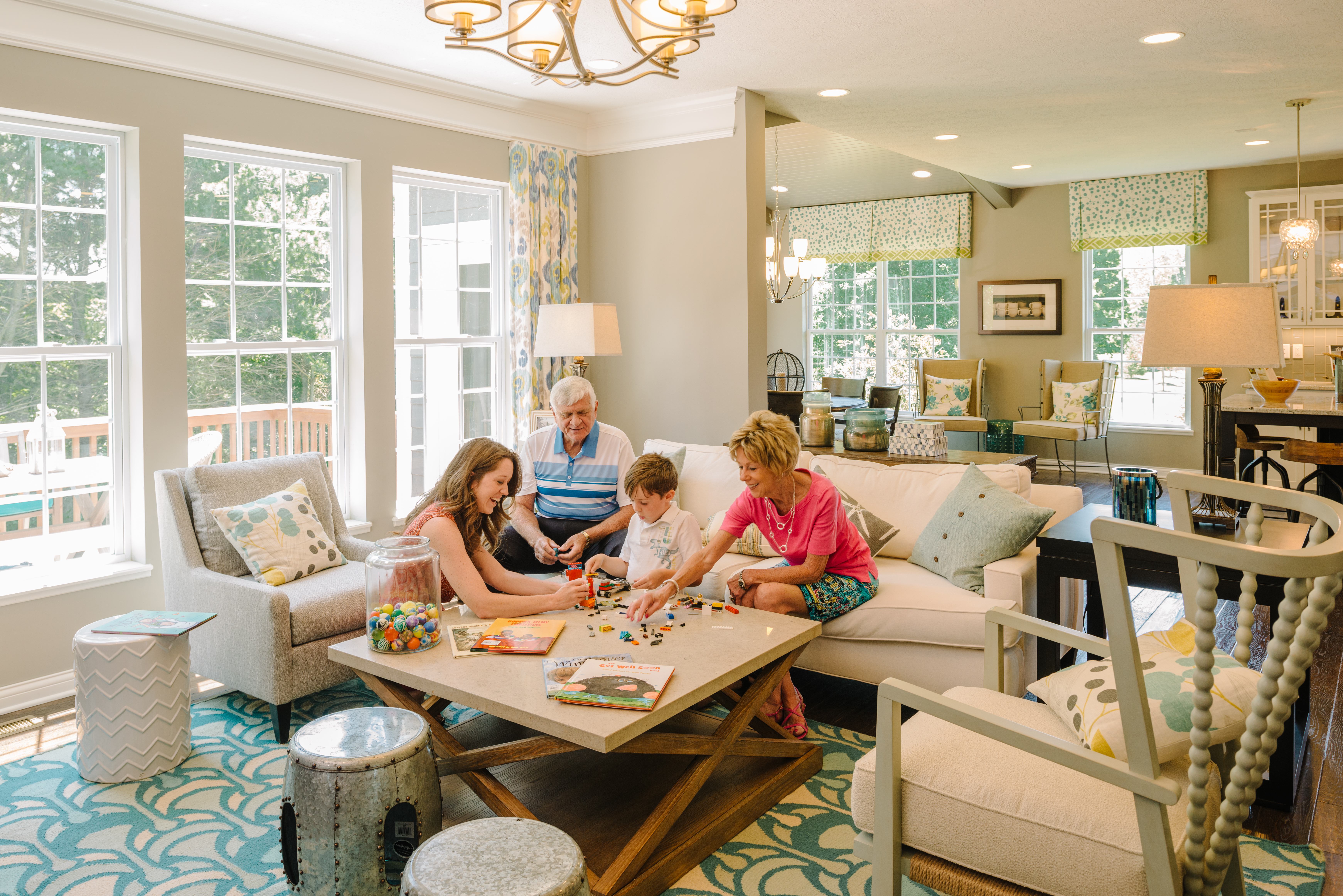 Grandparents Playing Game With Grandchildren in Living Room