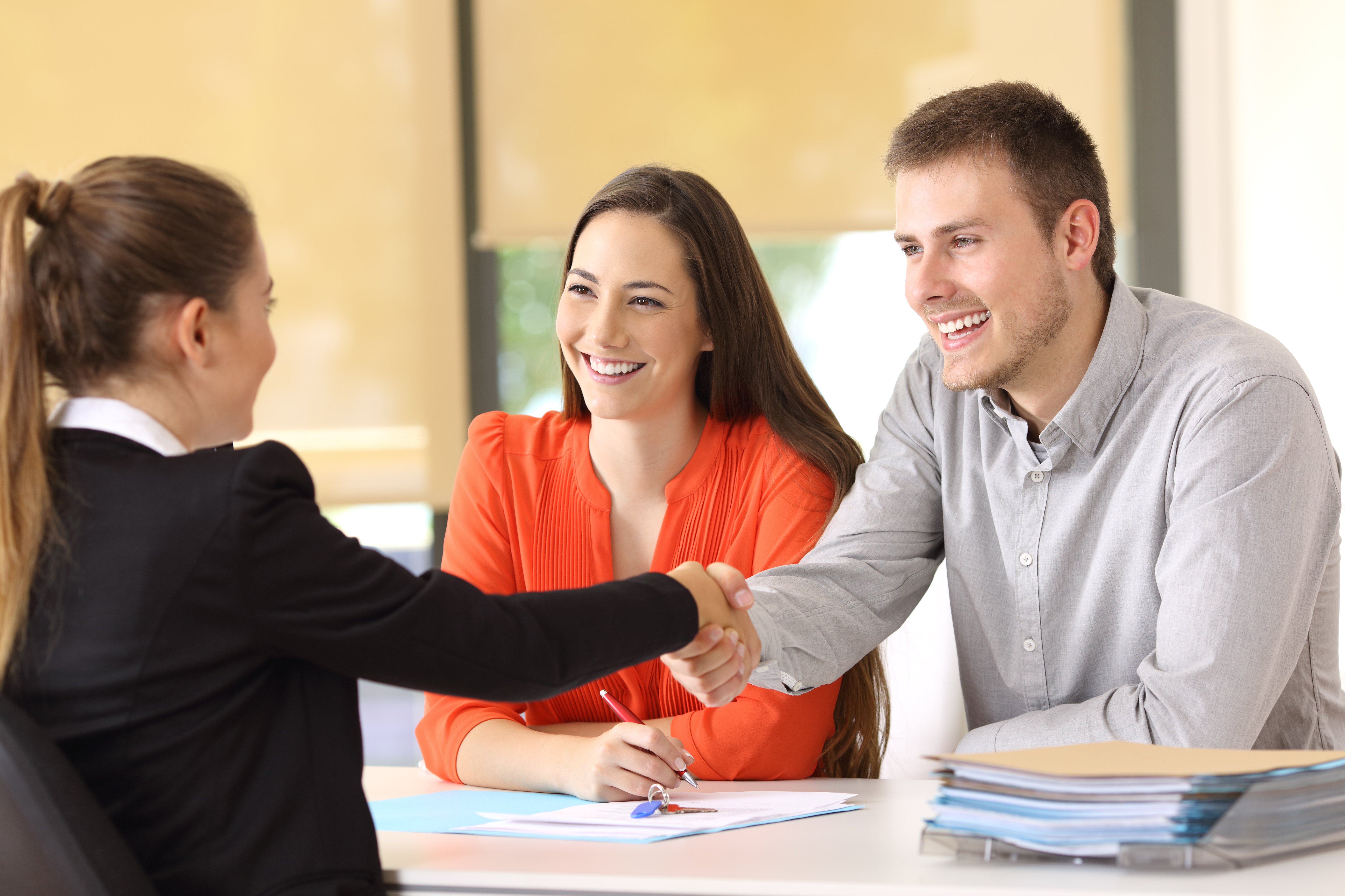 People Meeting With Loan Officer