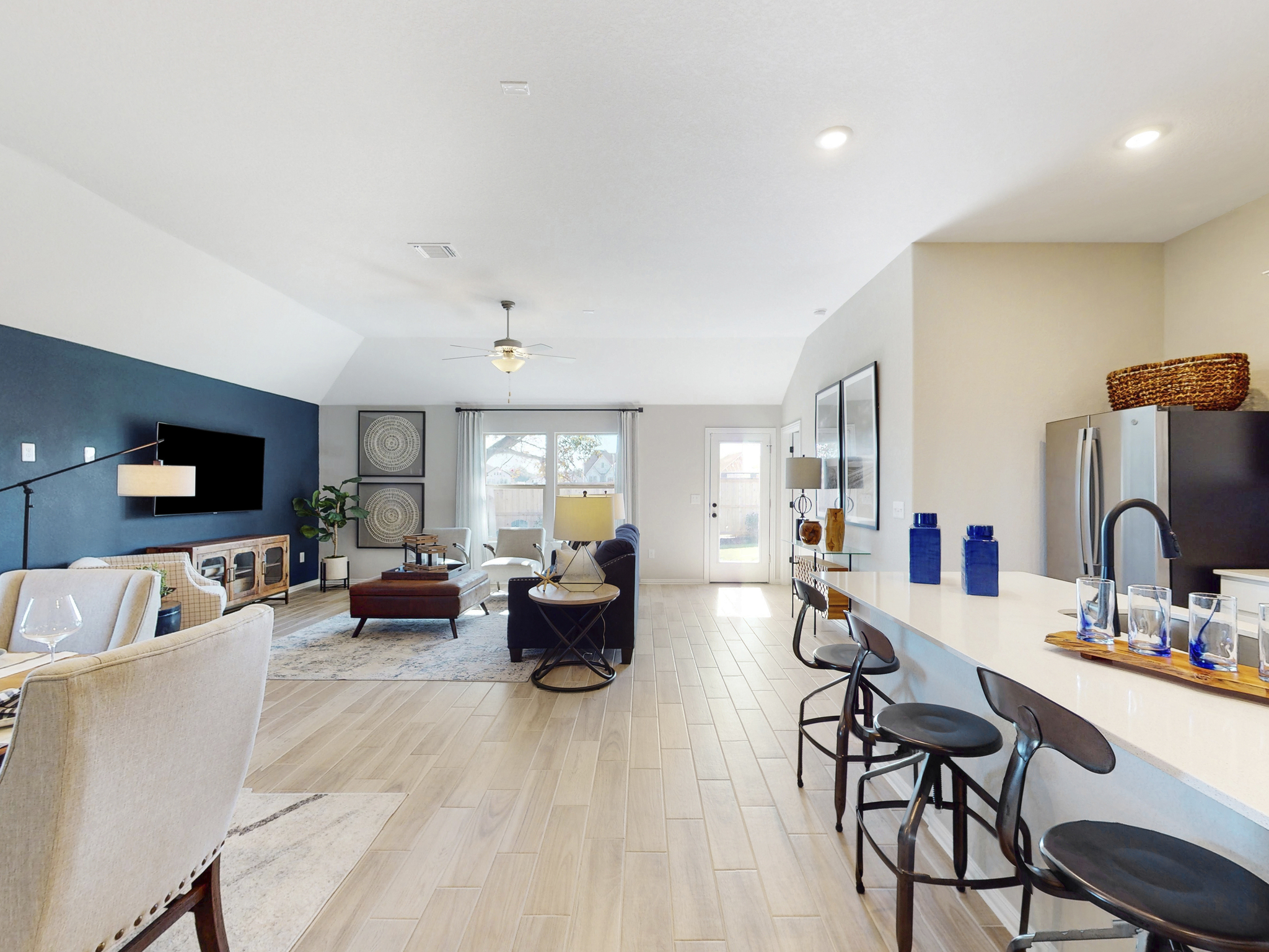 Open-Concept First Floor With Blue Decorative Elements