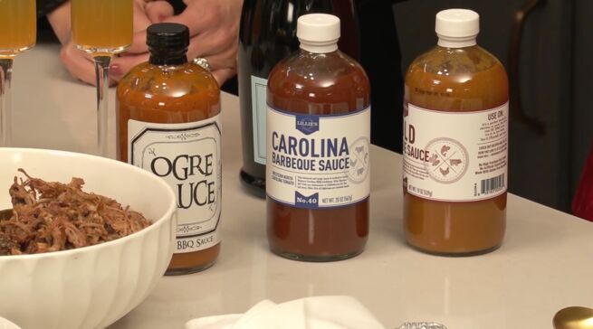 Close-up shot of 3 different bottles of barbecue sauce