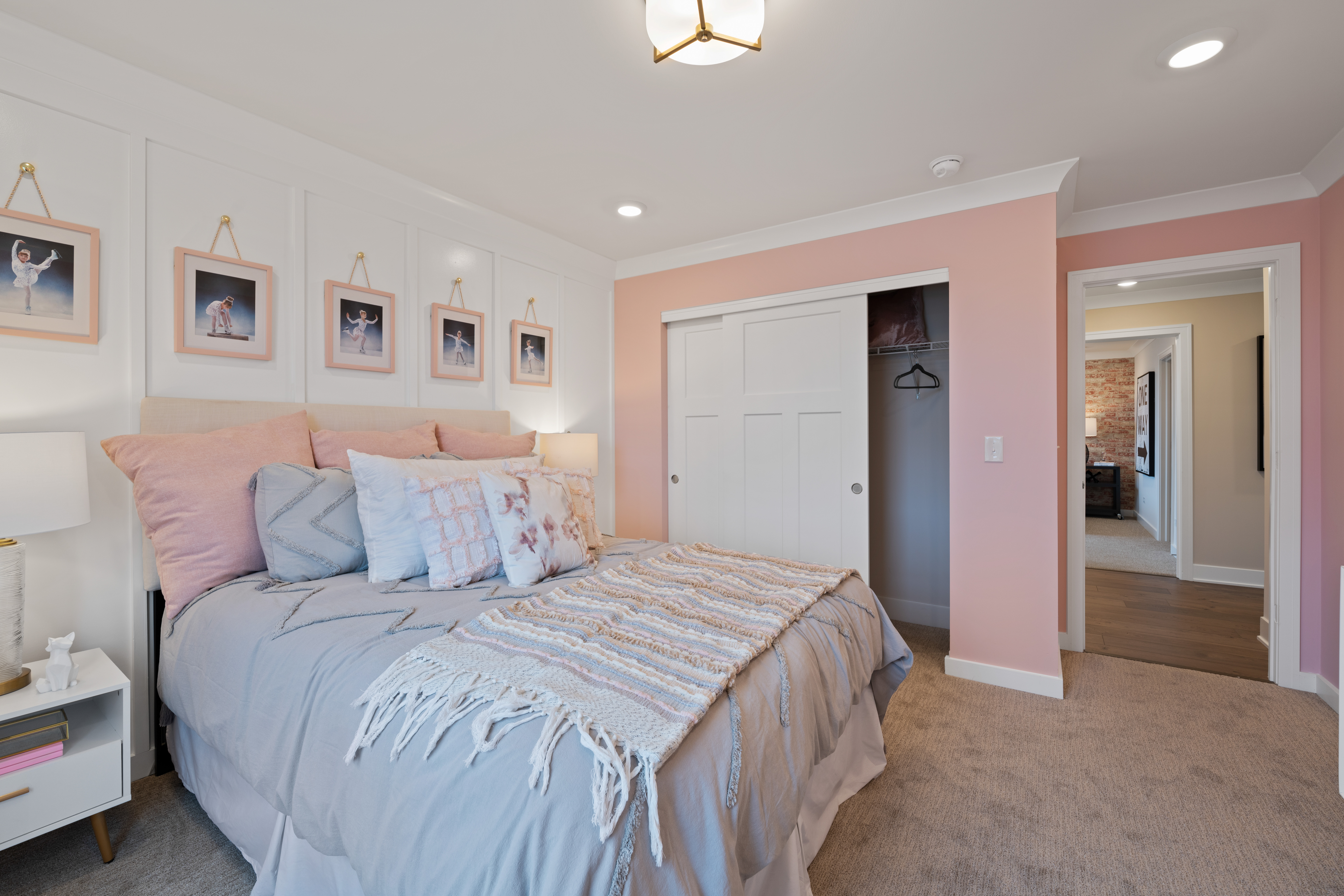 Pink Bedroom With Symmetrical Wall Décor