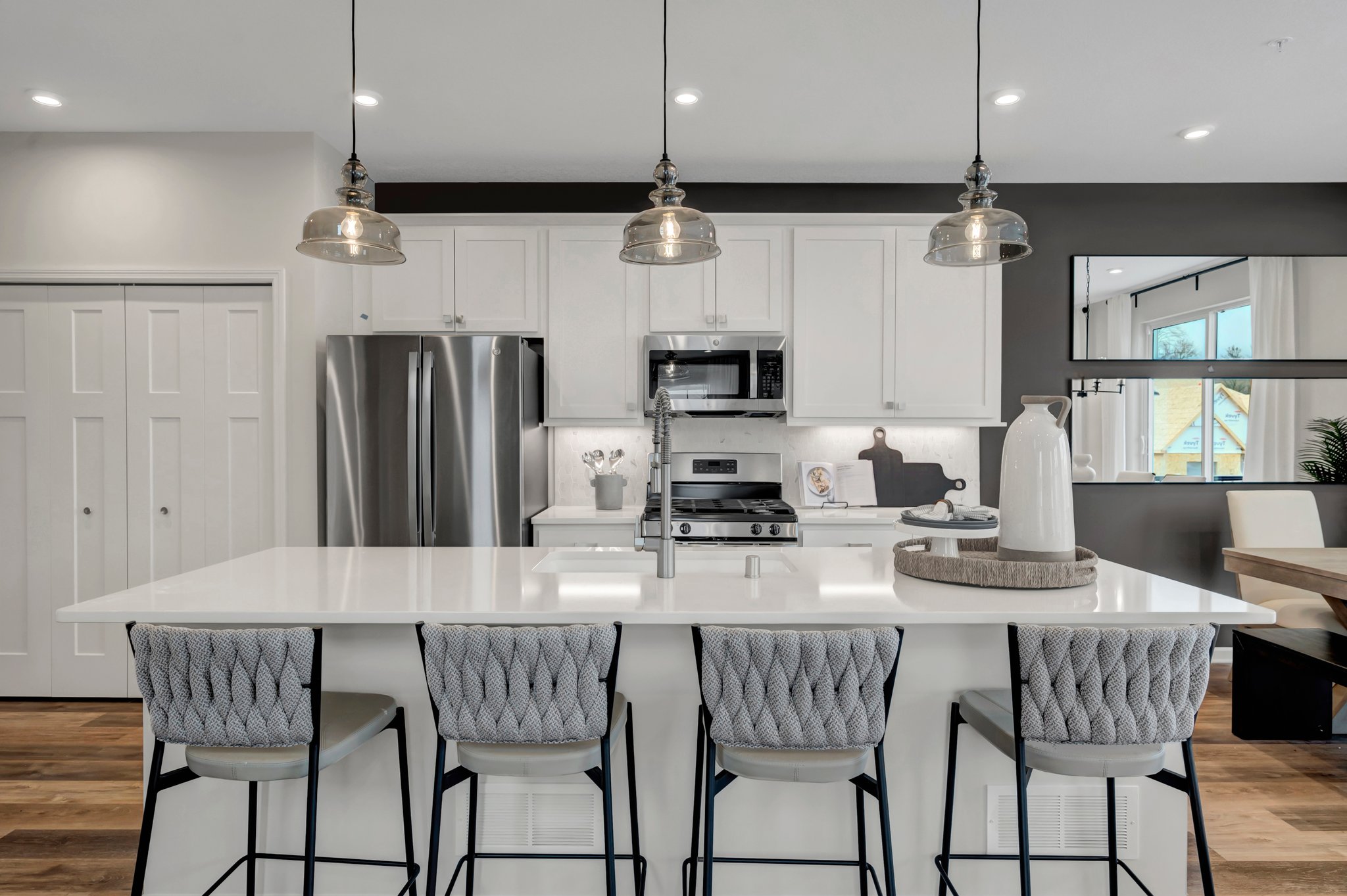 Kitchen With Island for Seating and White Cabinets