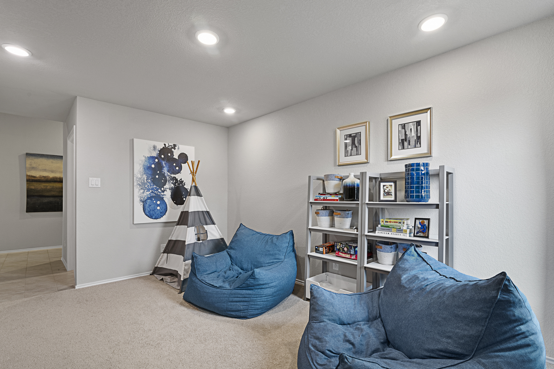 Play Room With Tent and Blue Bean Bag Chairs