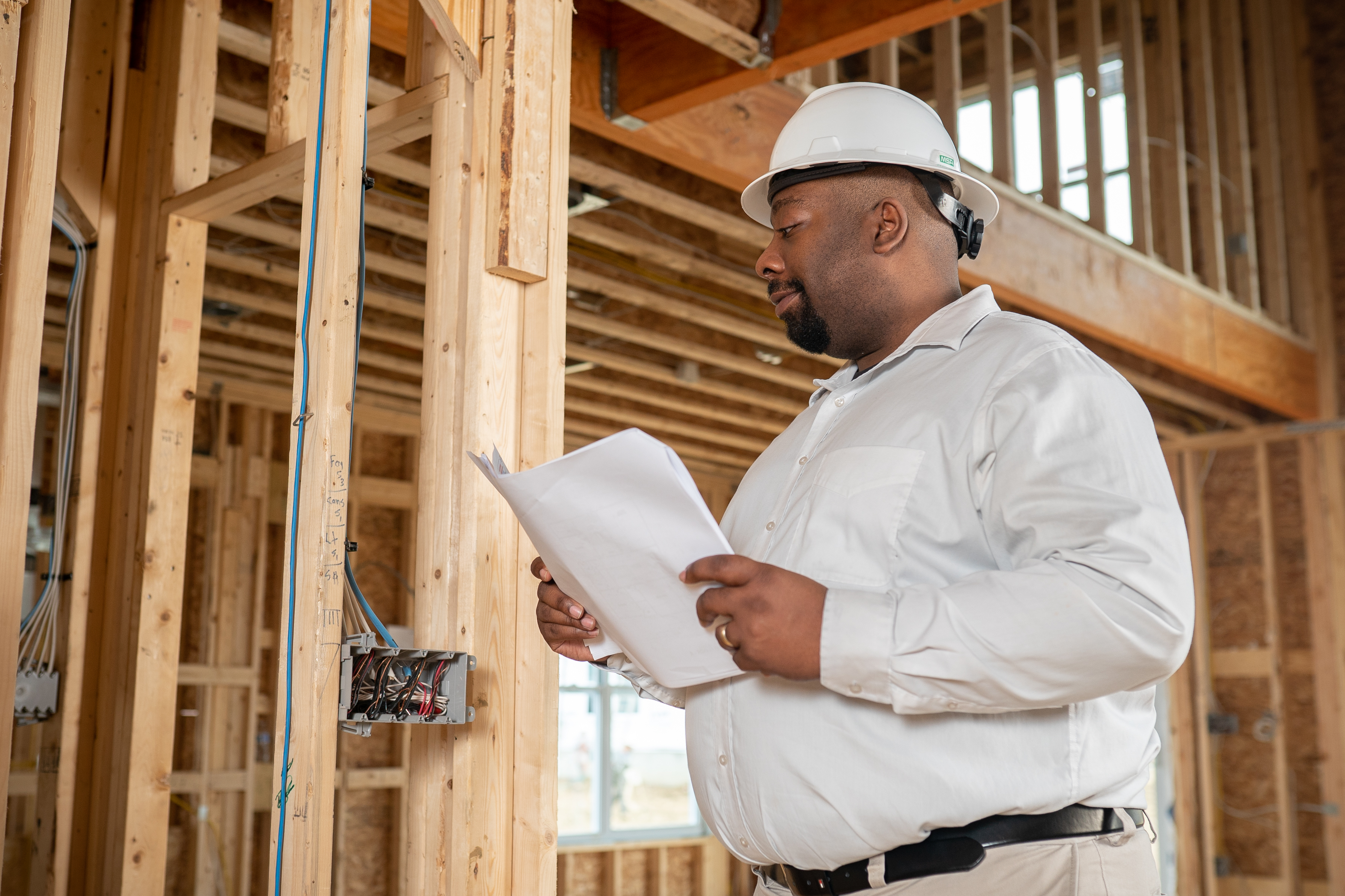 M/I Homes Construction Manager Inspecting Home