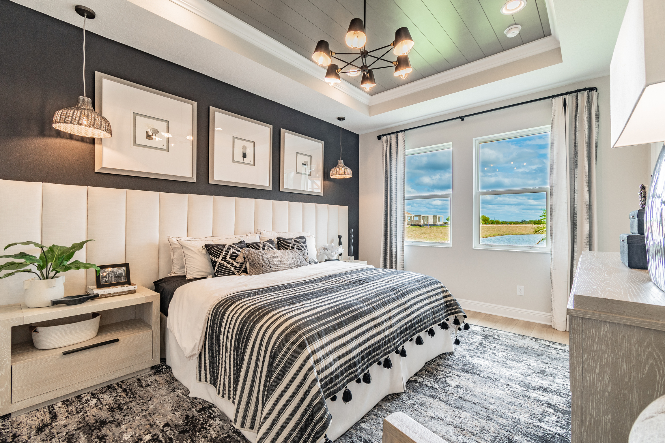 Owner's Bedroom With Black and White Boho Decor