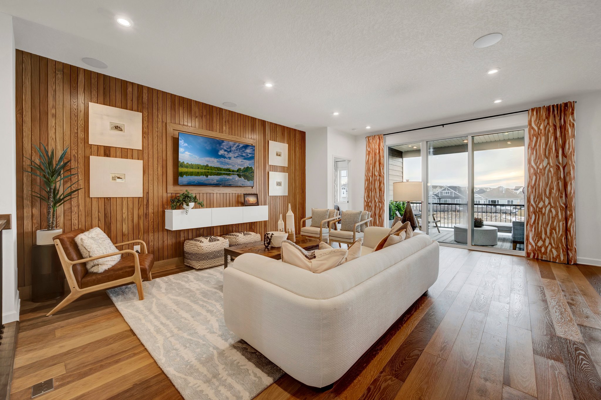 Living Room With Wall Art on Wood Accent Wall