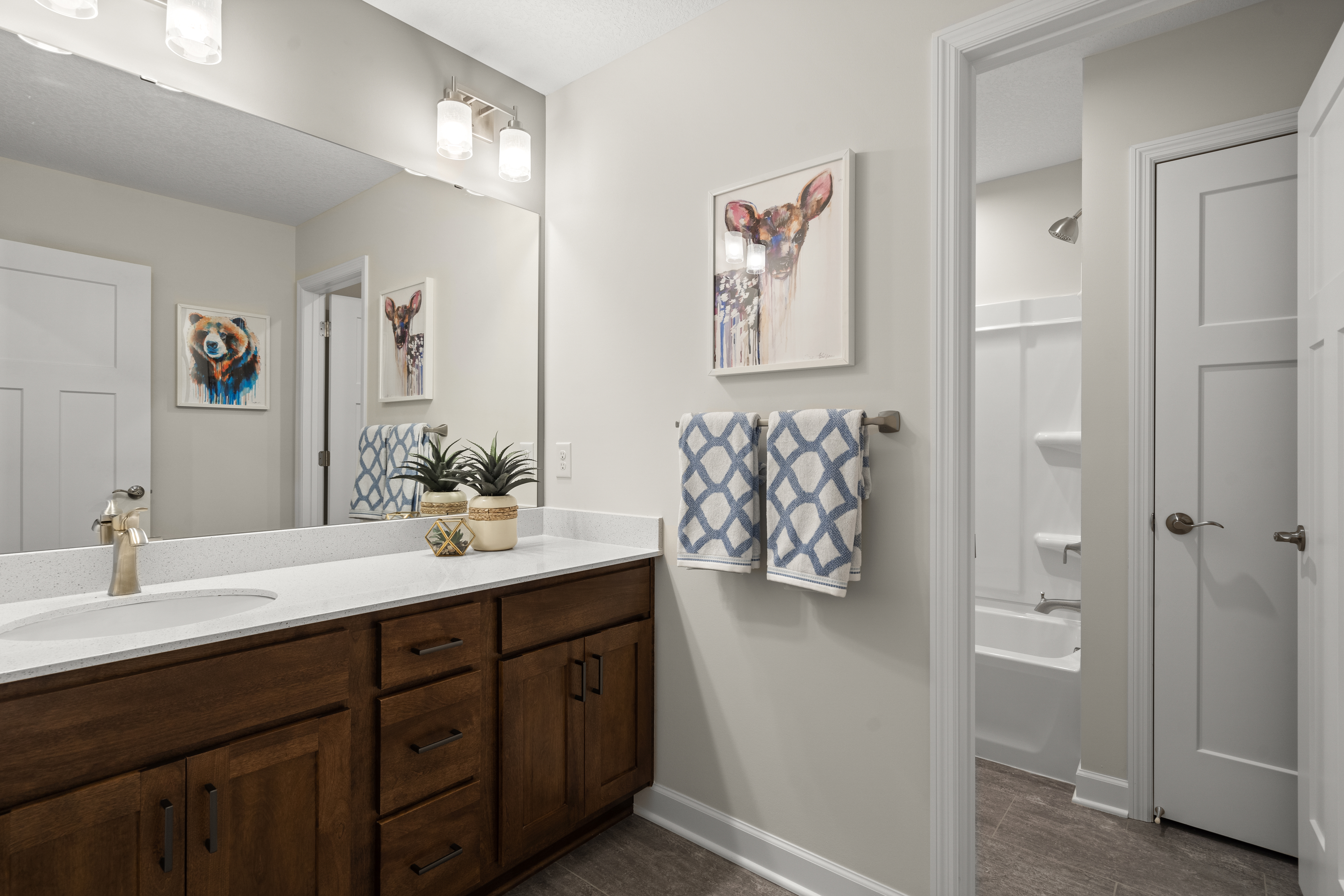 Bathroom With Animal-Themed Wall Art