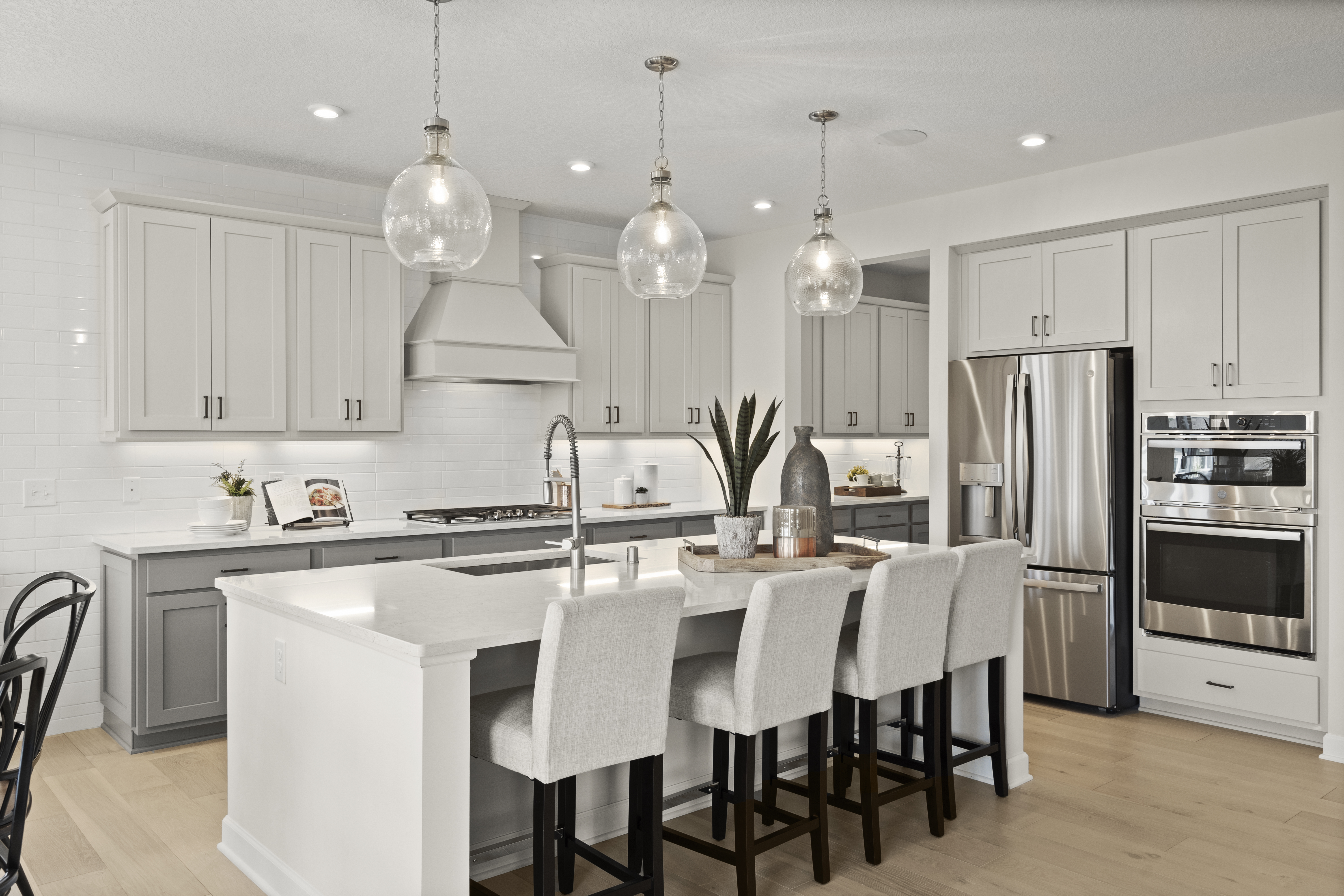 Light-Colored Kitchen With Double Wall Oven