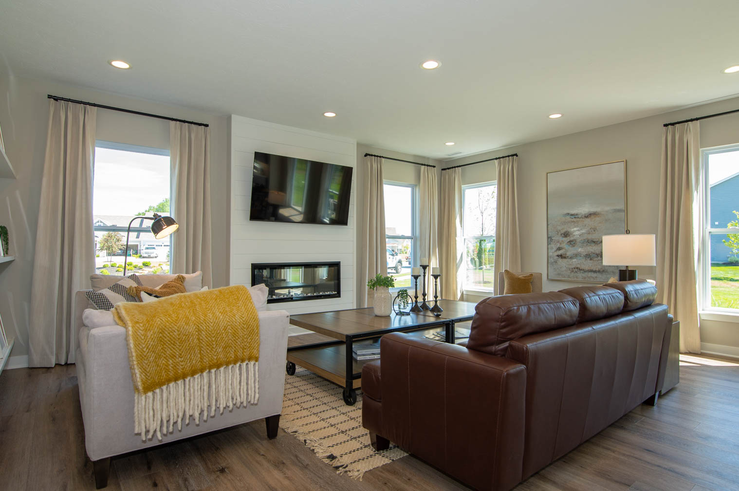 Living Room With Fall-Colored Throw Blanket