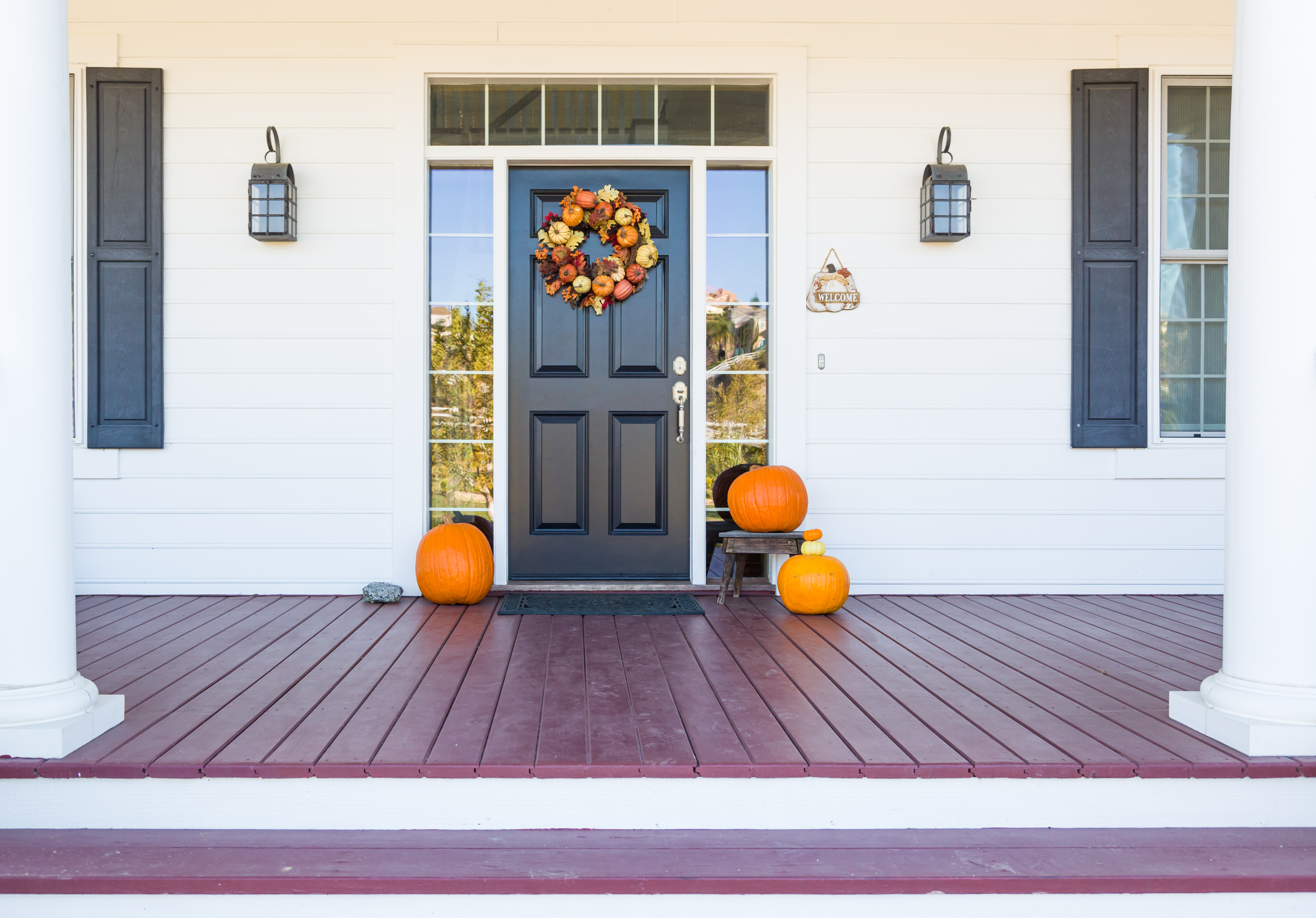 Front Door With Autumn Wreath and 3 Pumpkins