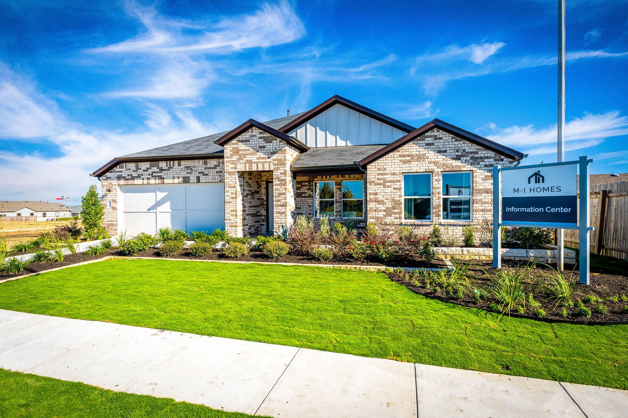 This is the front exterior of the Hawkins plan. This is the model home located in Carillon at 133...