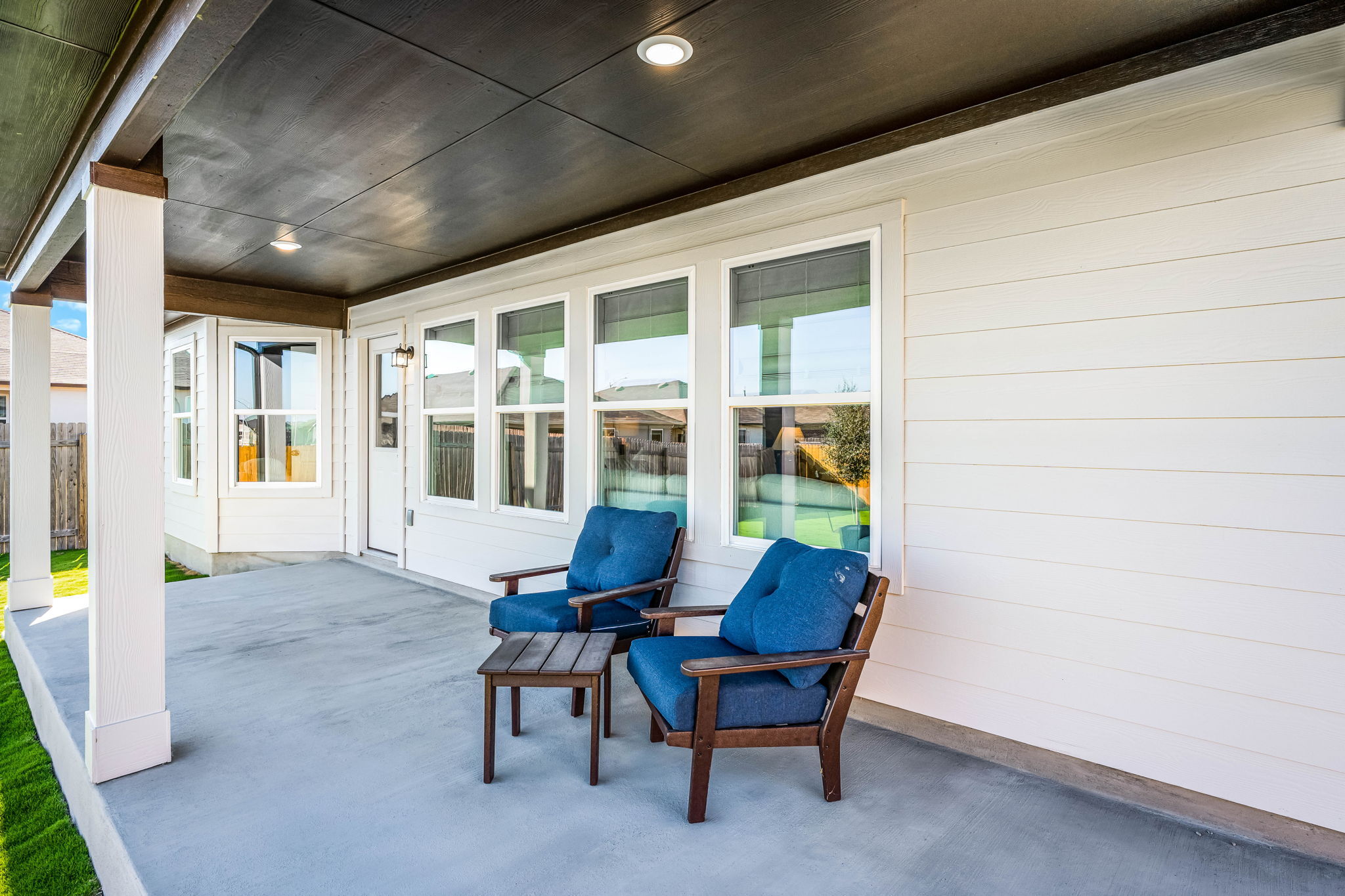 This is the back exterior of the Hawkins plan and is the model home in Carillon at 13305 Eppright...