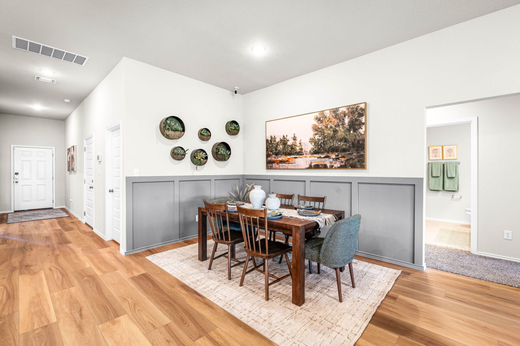 This is the dining area of the Hawkins plan within the model home in Carillon at 13305 Eppright Trace Blvd., Manor, TX.