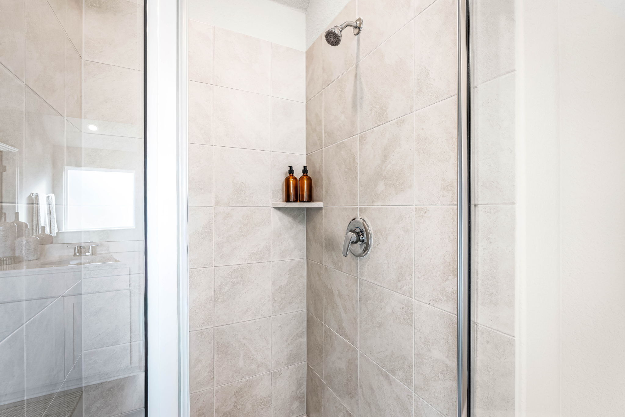 These are images of the secondary bathrooms in the Hawkins plan and is the model home in Carillon...