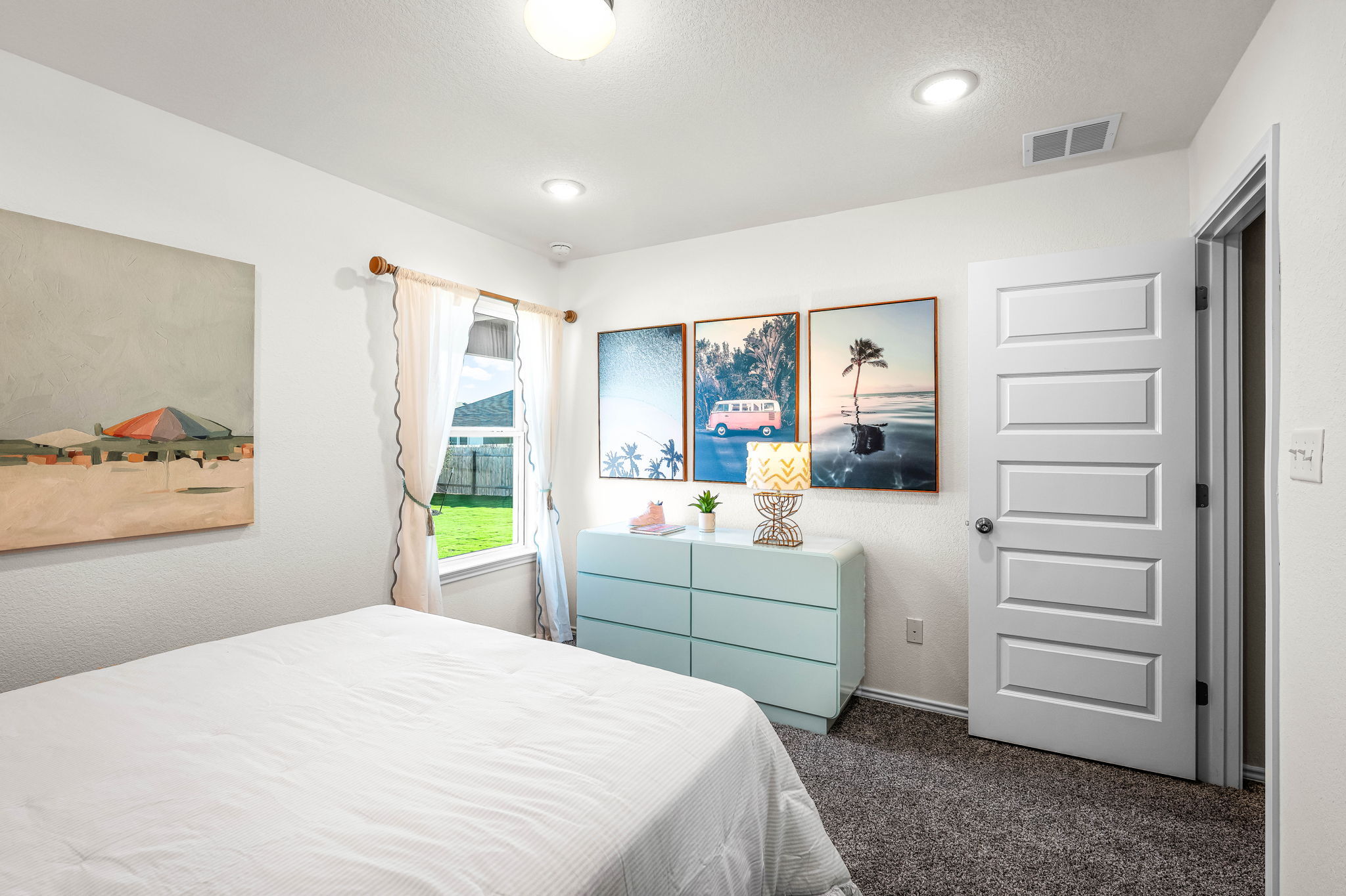 These are the secondary bedrooms of the Hawkins plan and is the model home in Carillon at 13305 E...