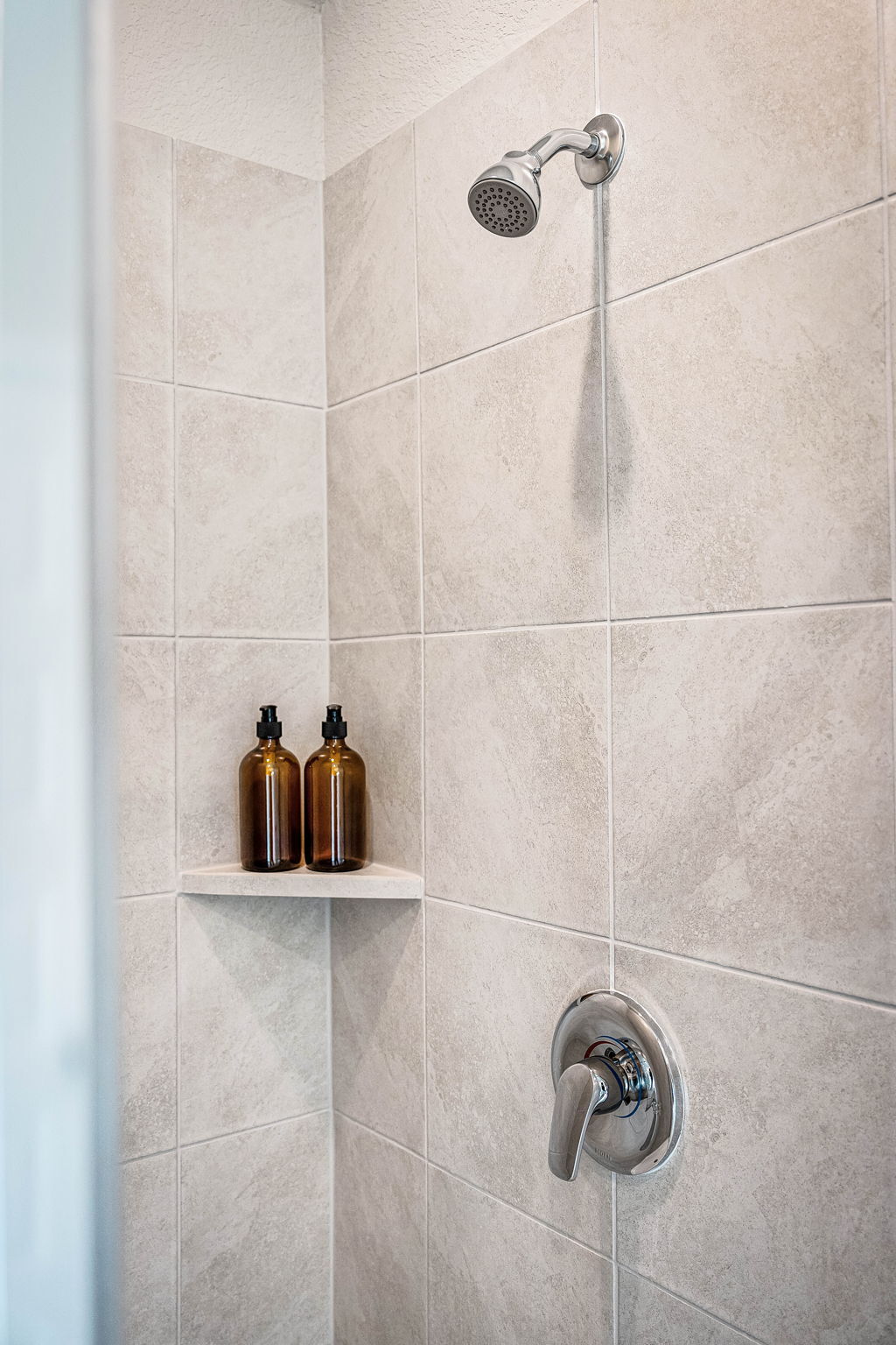 These are images of the secondary bathrooms in the Hawkins plan and is the model home in Carillon...