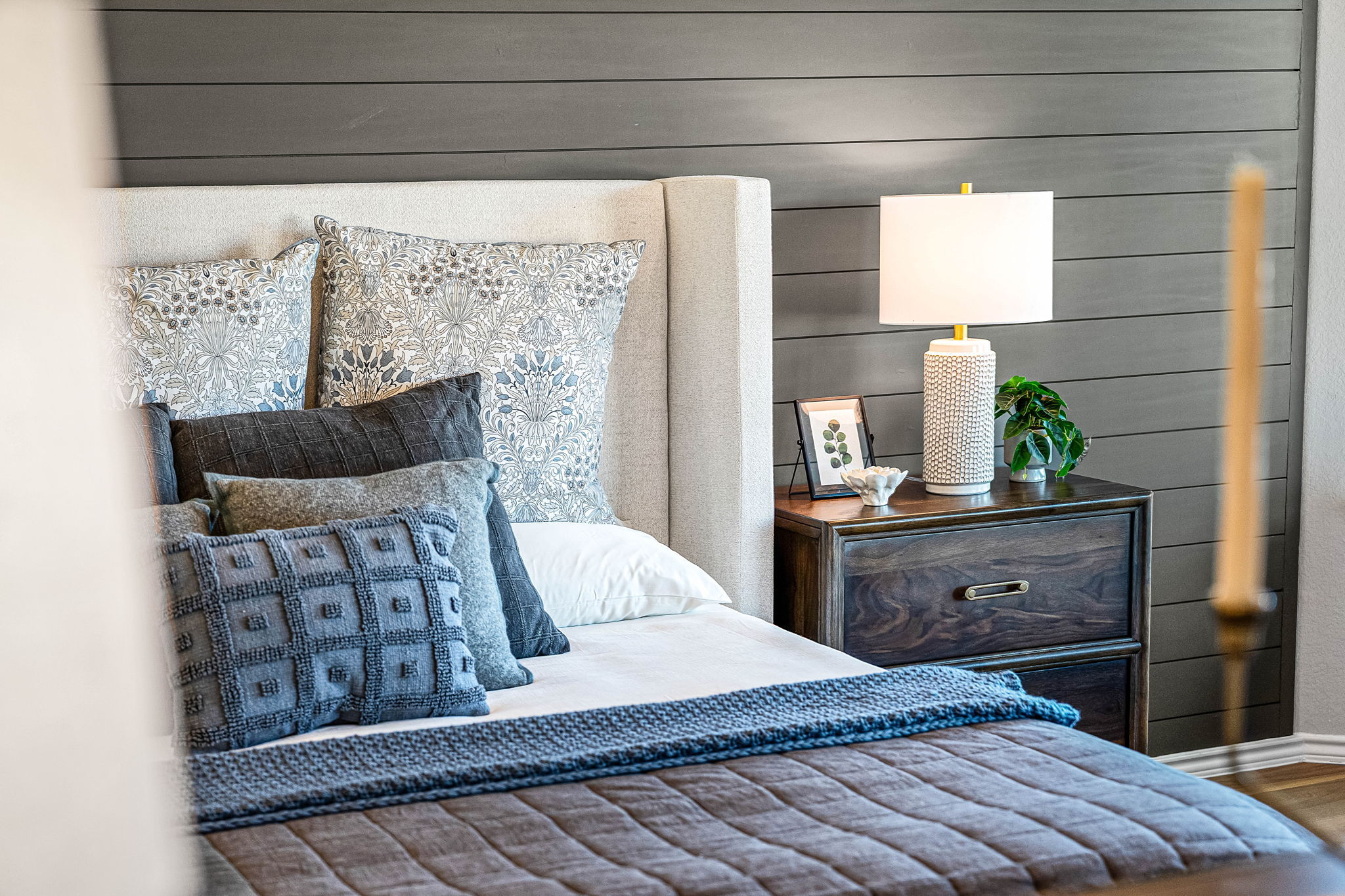 Primary bedroom in the model home located in Carillon at 13305 Eppright Trace Blvd., Manor, TX 