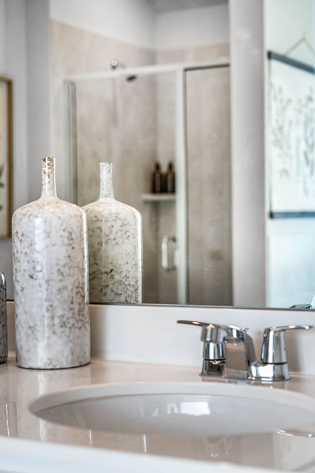 These are images of the secondary bathrooms in the Hawkins plan and is the model home in Carillon...