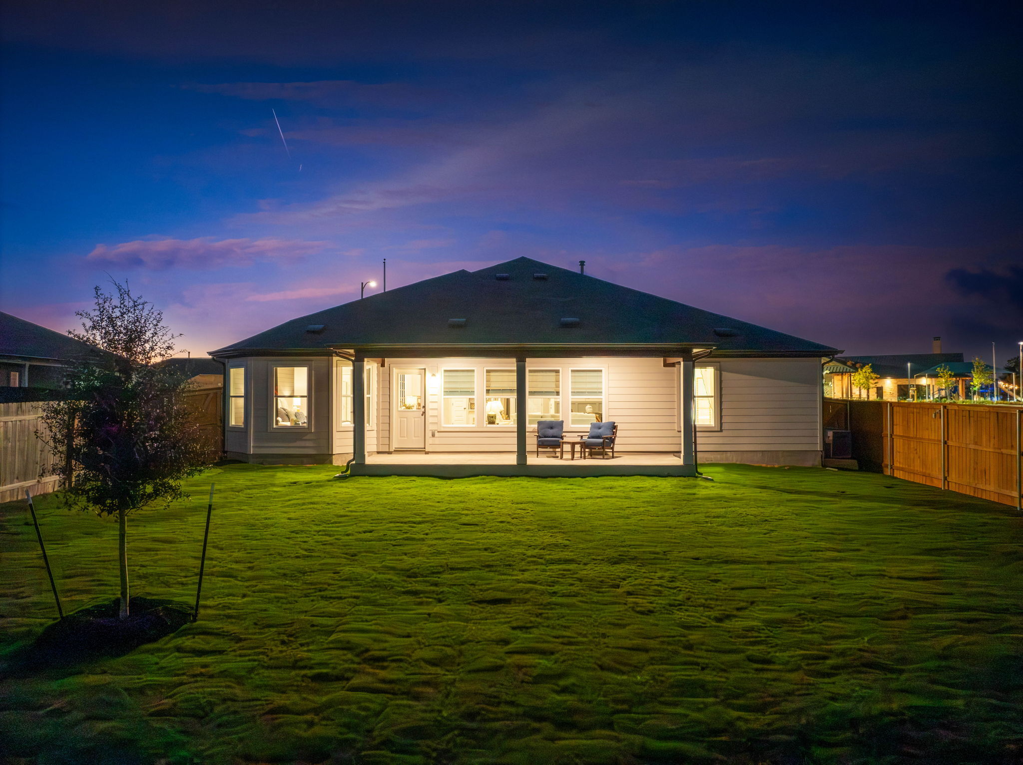 This is the back exterior of the Hawkins plan and is the model home in Carillon at 13305 Eppright...