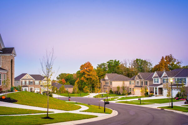 Streetscape of a large homes in a residential neighborhood
