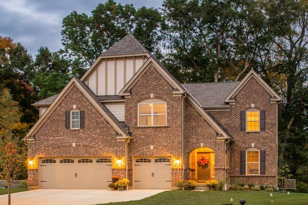 Exterior shot of a luxury, brick-clad home