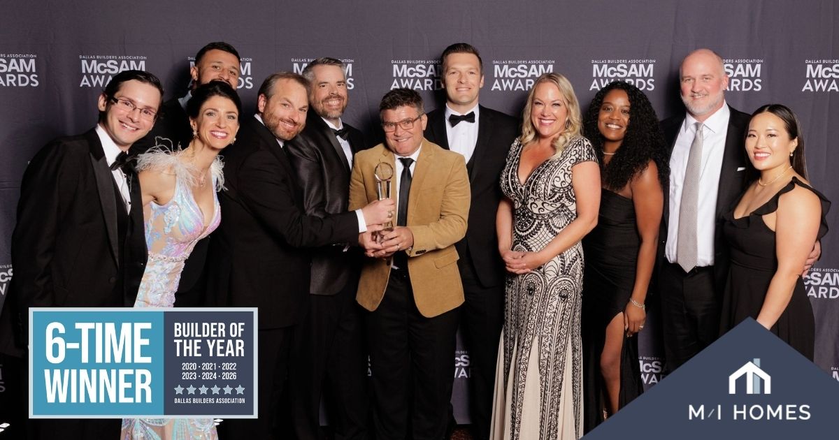 group shot of the team winning the builder of the year