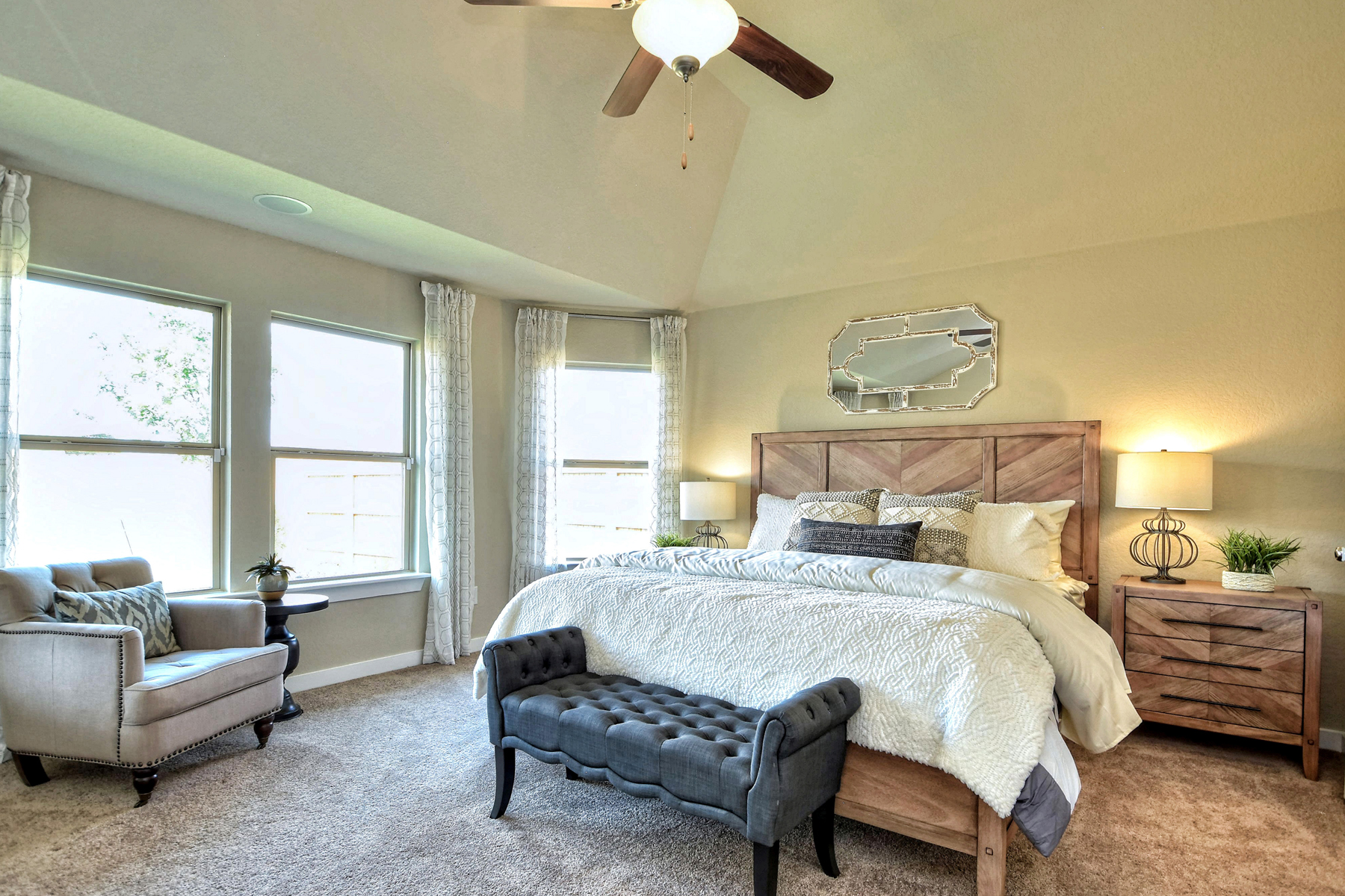 Owner's Bedroom With Accent Bench and Accent Chair