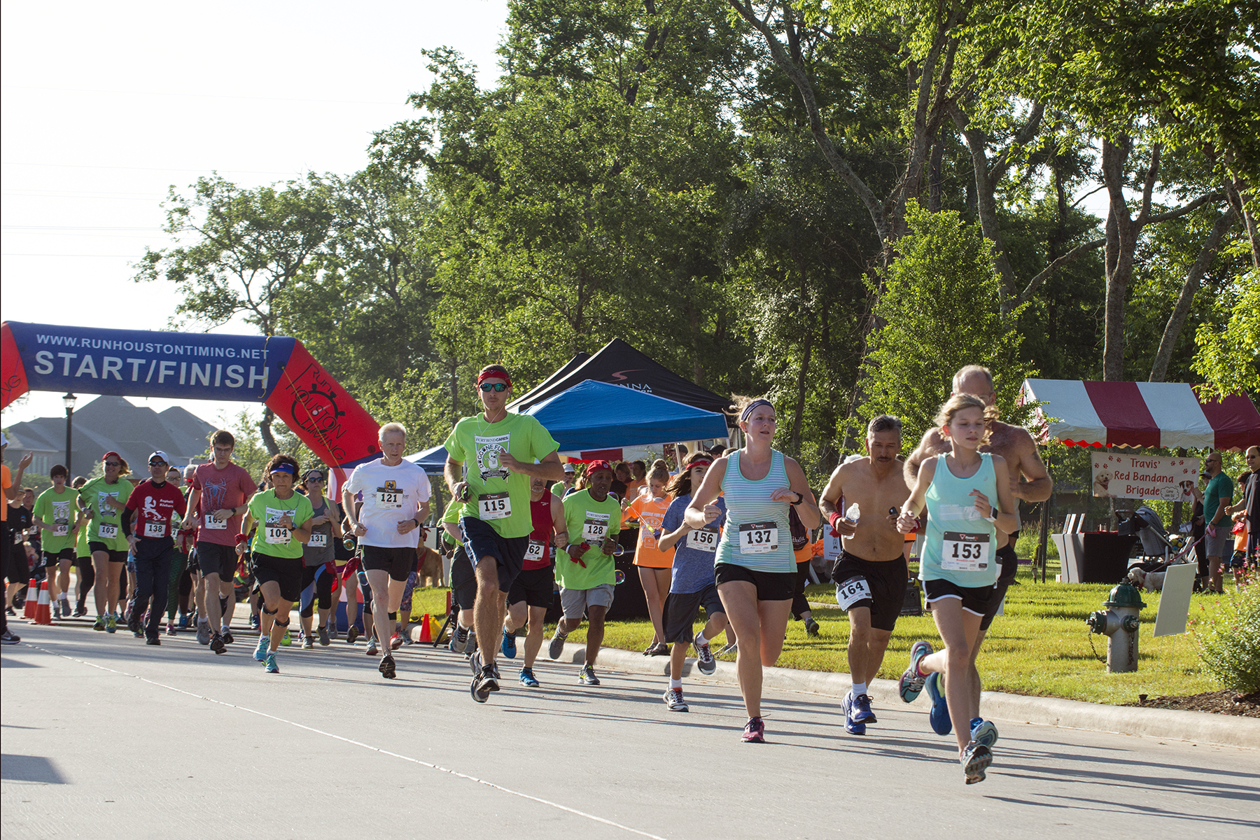 People Running a Marathon in Houston, TX