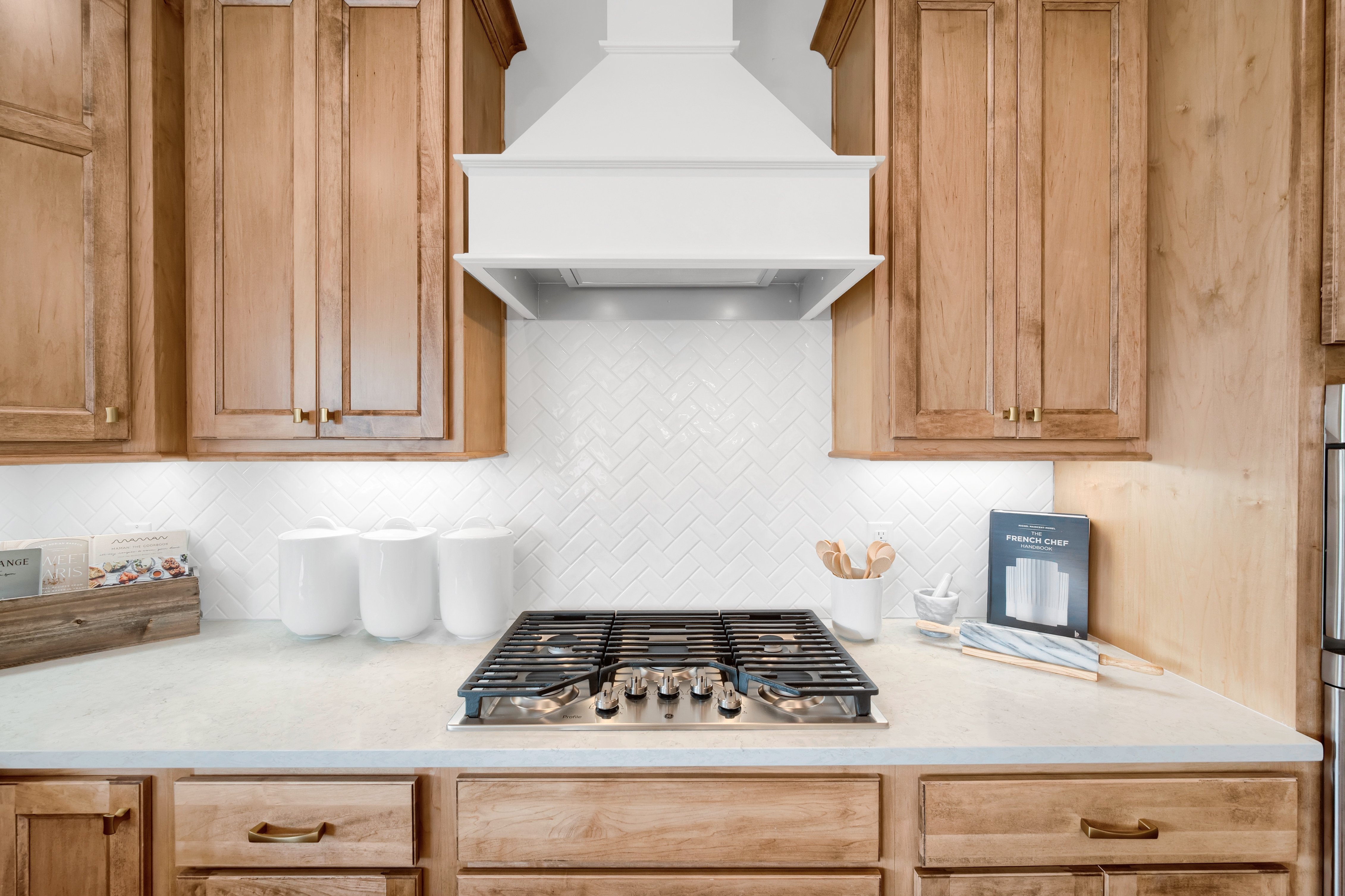 Kitchen Cooktop and Backsplash in M/I Homes Model Home