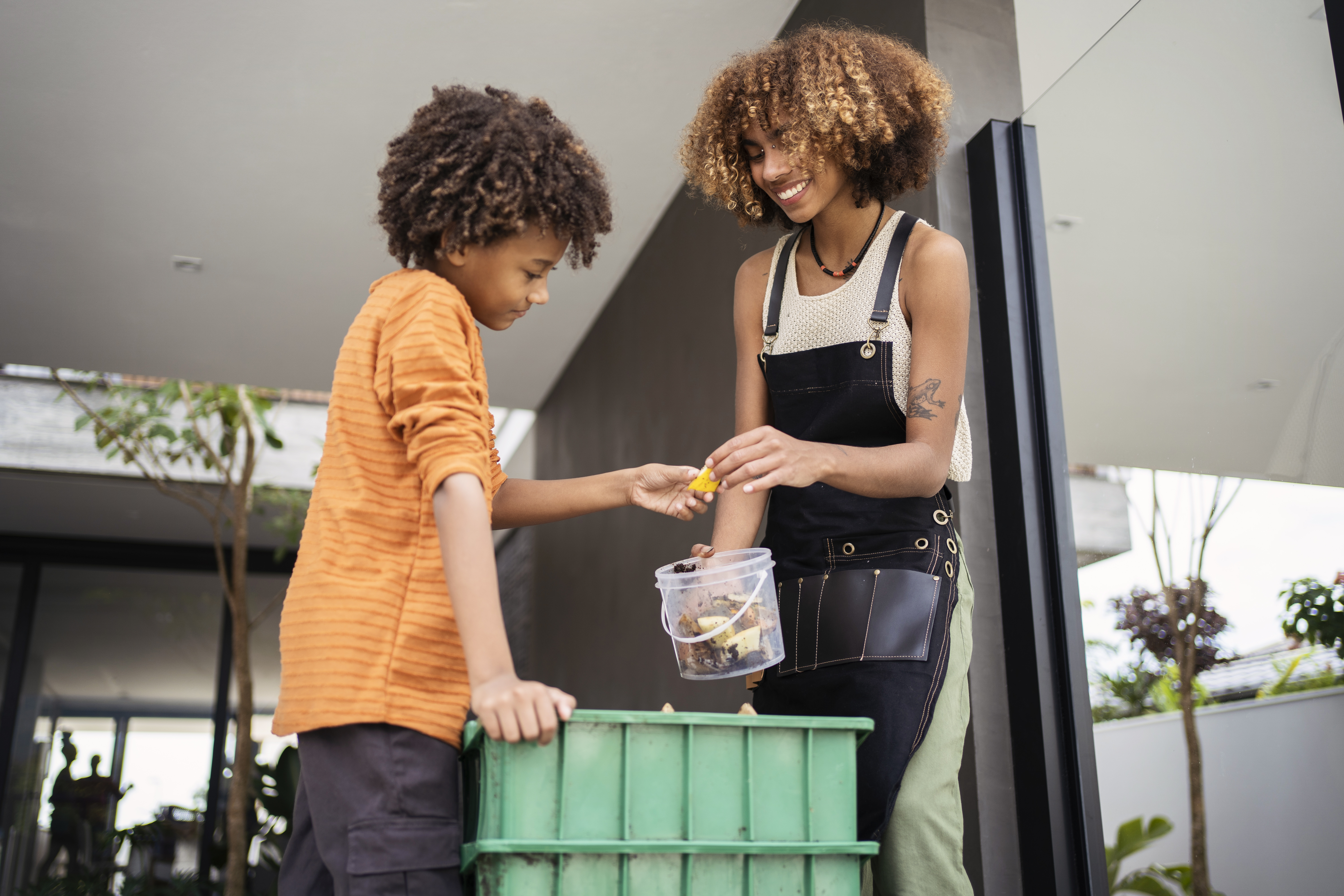 Mom and Son Composting Together