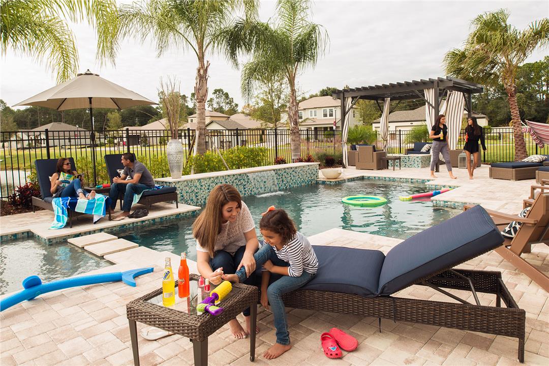 Families Hanging Out by Pool